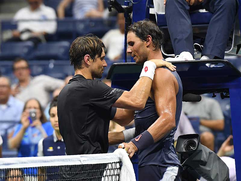  Rafael Nadal (kanan) berbincang dengan sahabatnya David Ferrer (kiri)