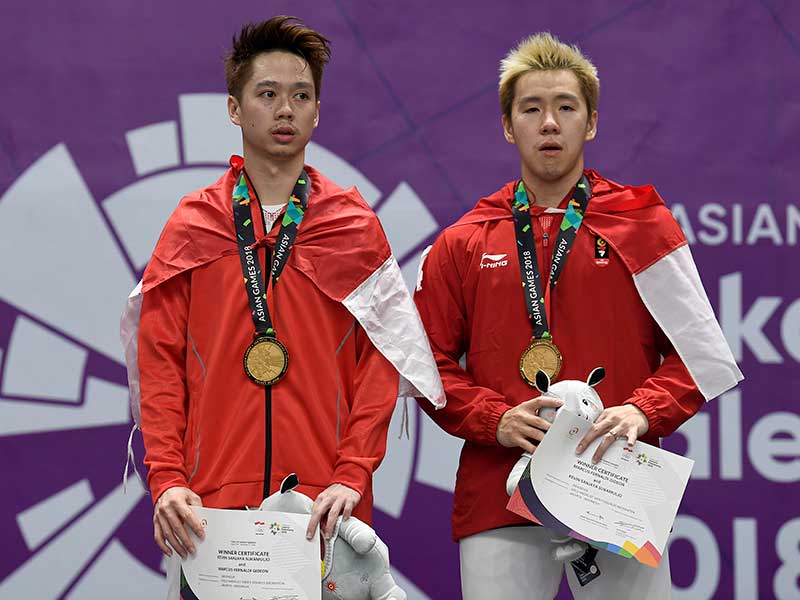 Pebulu tangkis ganda putra Indonesia Marcus F Gideon (kanan) dan Kevin Sanjaya (kiri)