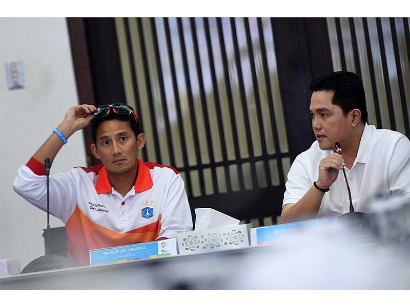 Sandiaga Uno (kiri) dan Erick Thohir (kanan)