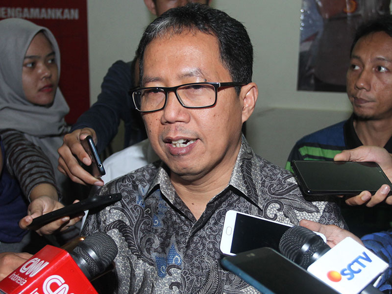 Plt Ketum PSSI  Joko Driyono menjawab pertanyaan wartawan saat akan menjalani pemeriksaan di Krimum, Polda Metro Jaya, Jakarta, Kamis (24/1/2019).