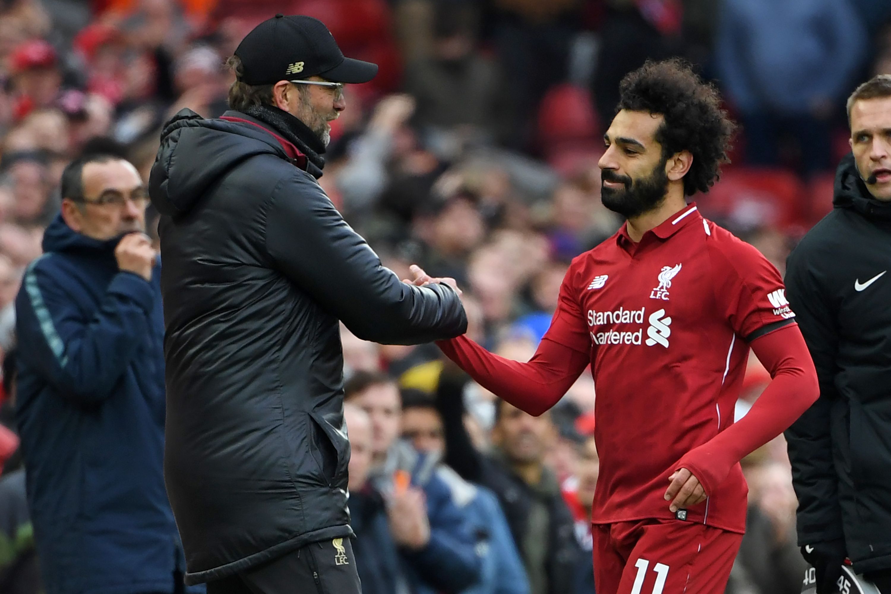 Juergen Klopp (kiri) dan Mohamed Salah