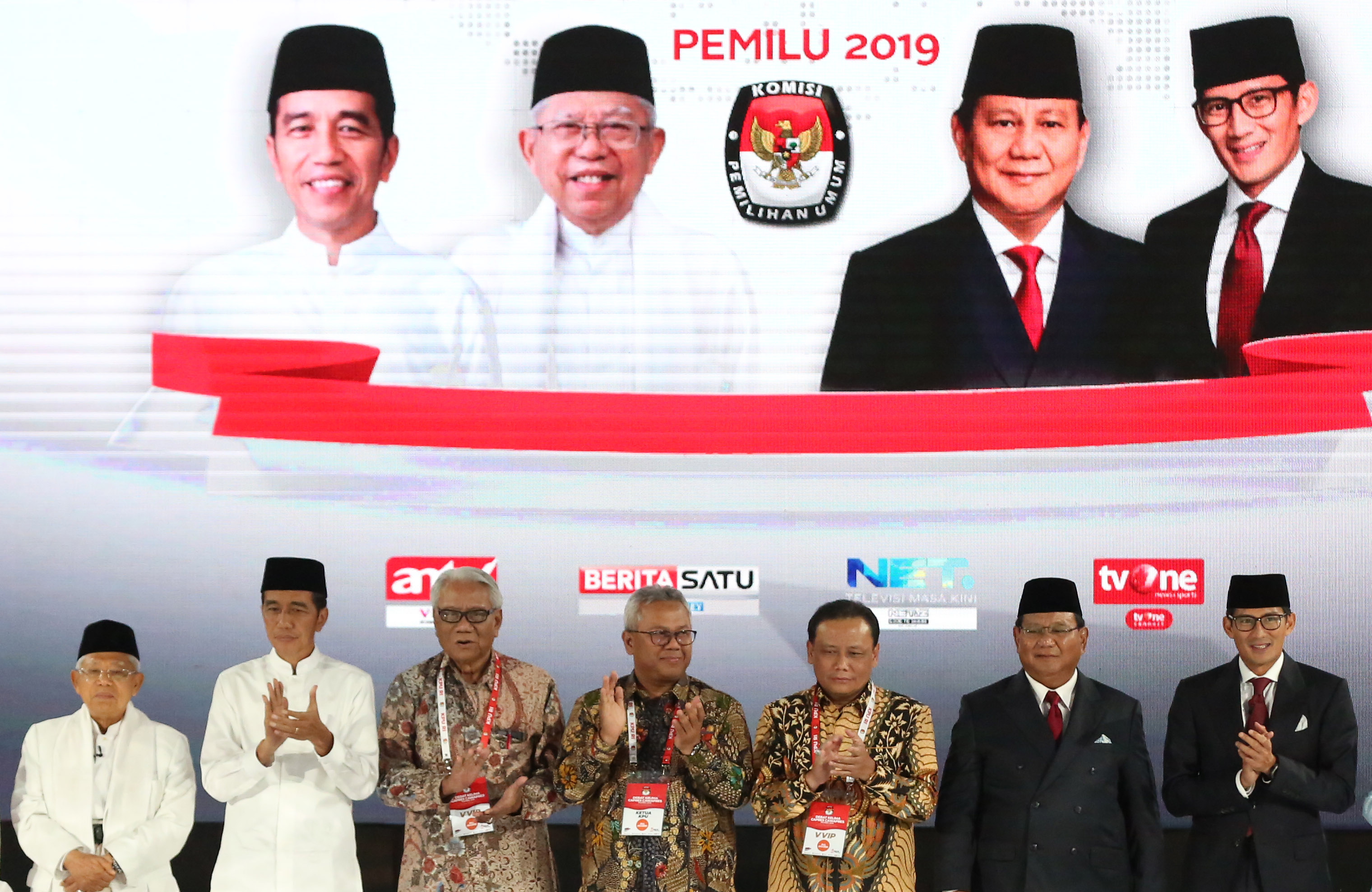 Pasangan capres-cawapres nomor urut 01 Joko Widodo-Ma’ruf Amin (kiri), pasangan capres-cawapres nomor urut 02 Prabowo Subianto-Sandiaga Uno.