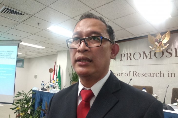 Kurnadi Gularso usai sidang promosi doktor di Universitas Nusantara di Jakarta, Senin.