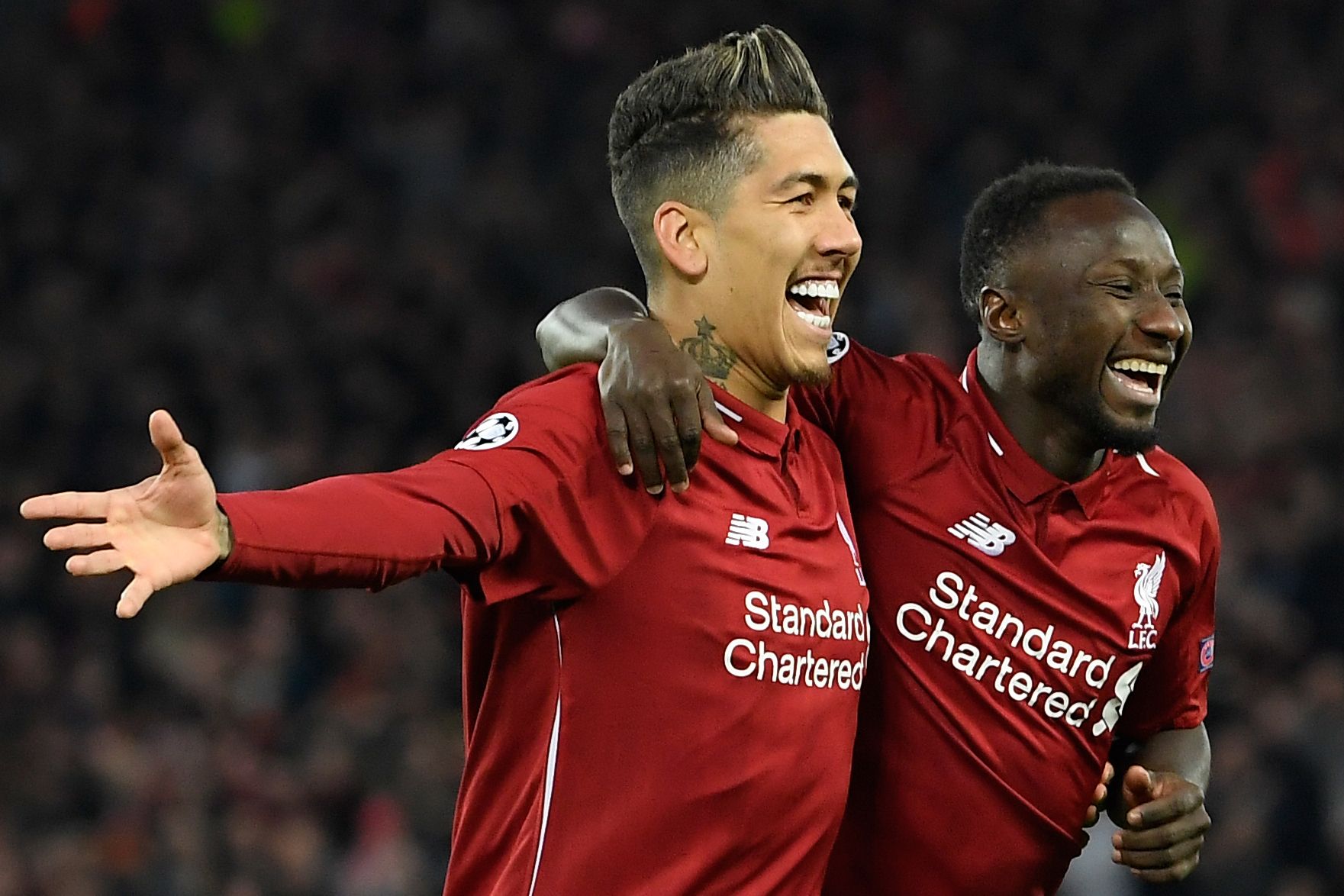 Pencetak gol Liverpool dalam laga leg pertama perempat final Liga Champions melawan FC Porto Roberto Firmino (kiri) dan Naby Keita.