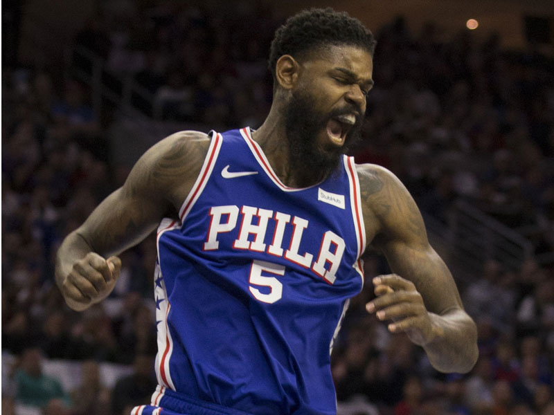 Pemain Center Philadelphia 76ers Amir Johnson.