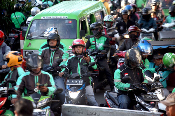 Ilustrasi pengemudi Gojek