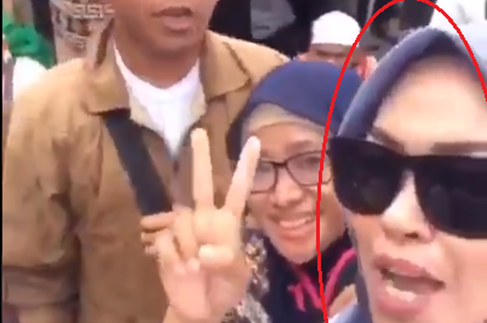 HS dan sosok wanita yang jadi buron polisi.