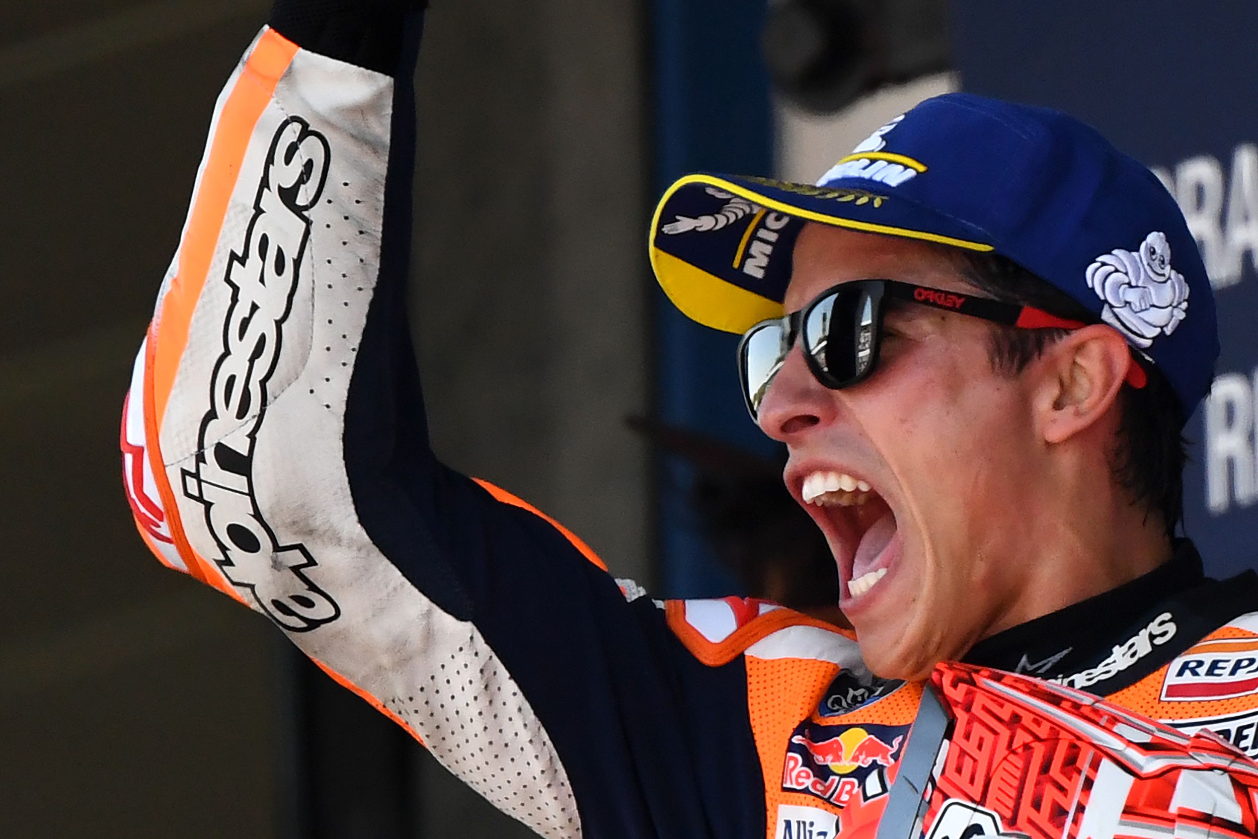 Pembalap Repsol Honda Mar Marquez merayakan kemenangannya di GP Spanyol