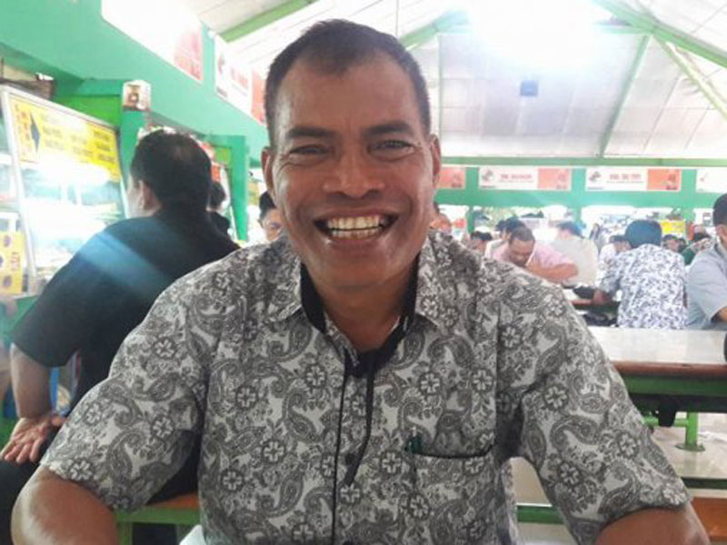 Komisioner Komisi Informasi Pusat Roman Lendong