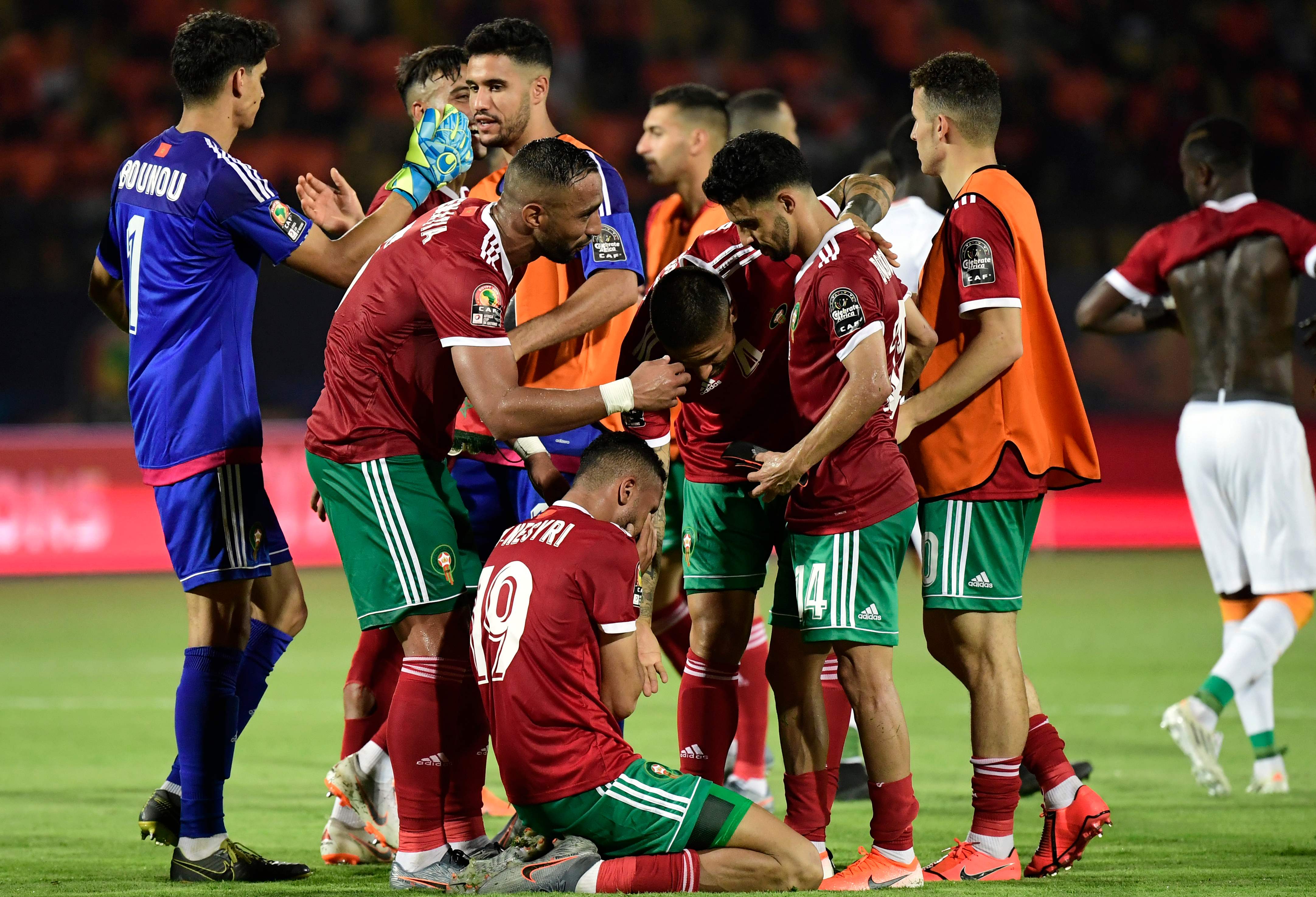 Para pemain Maroko merayakan kemenangan mereka atas Pantai Gading di laga Piala Afrika.