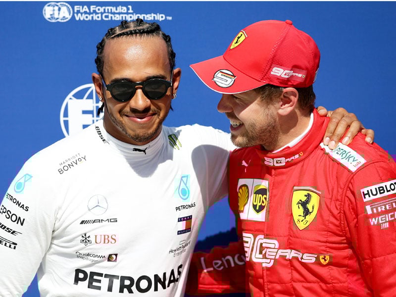 Lewis Hamilton(kiri) dan Sebastian Vettel