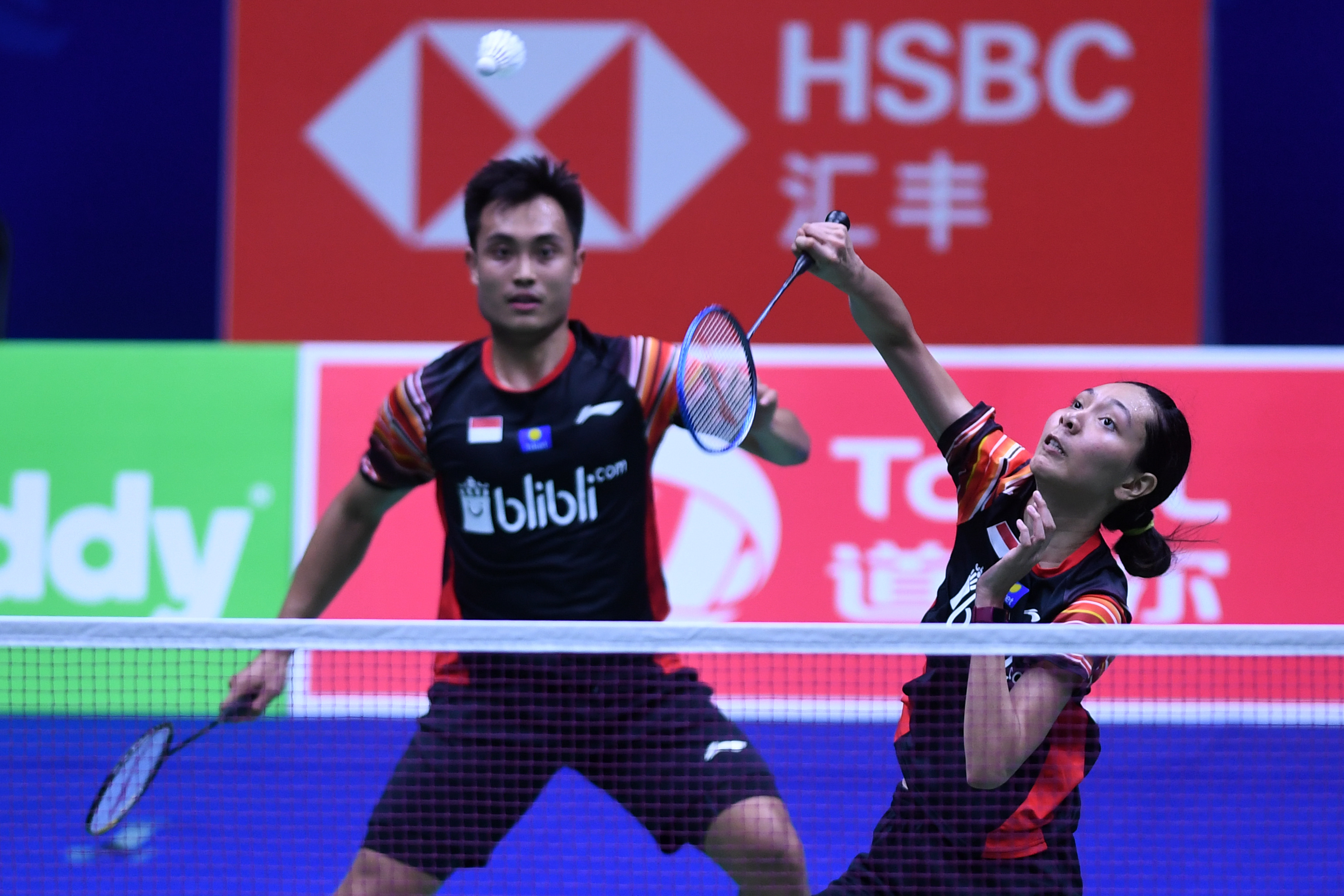 Pasangan ganda campuran Indonesia Gloria Emanuelle Widjaja (kanan) dan Hafiz Faizal