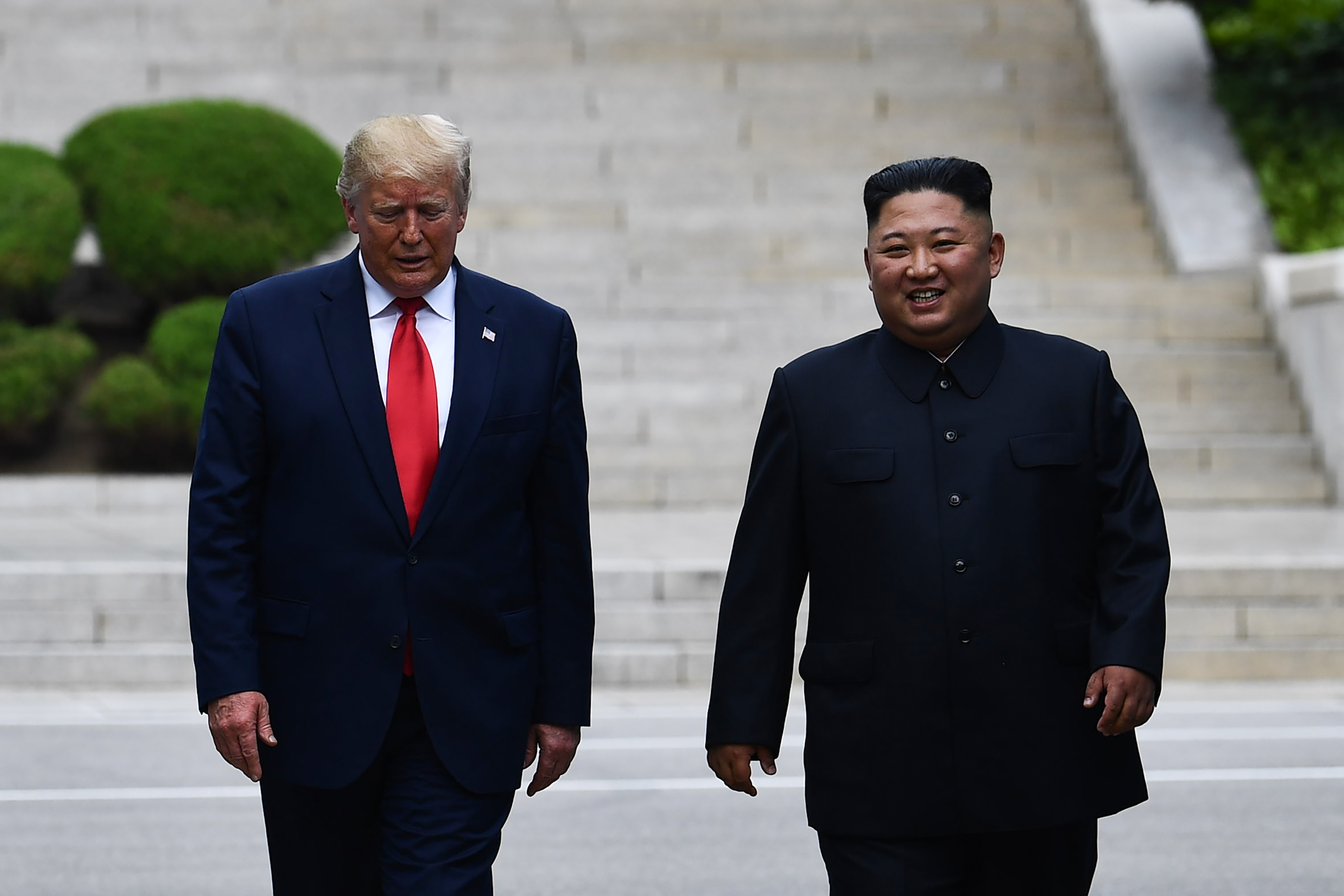 Pemimpin Korea Utara Kim Jong Un dan Presiden AS Donald Trump