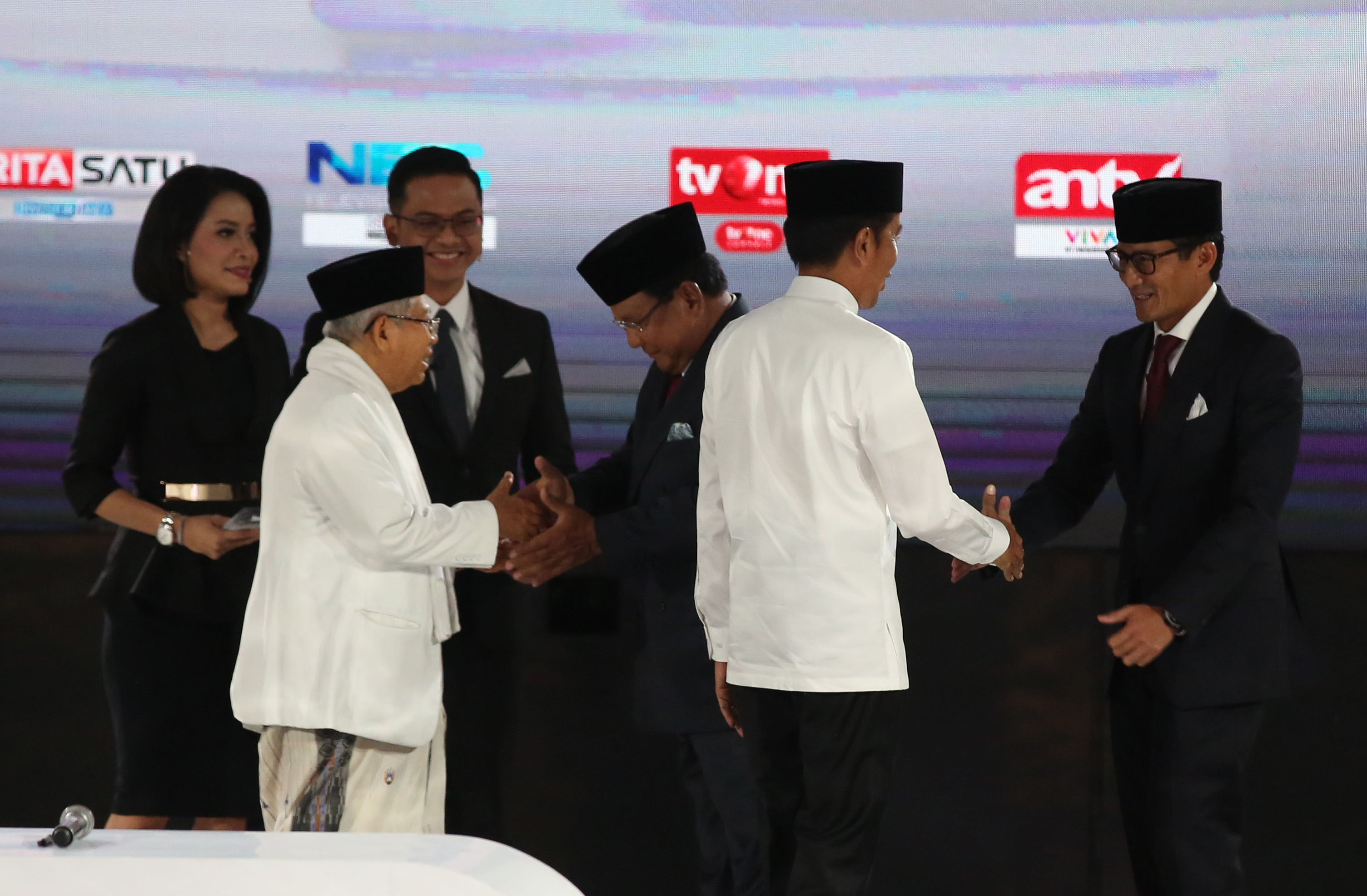 Pasangan capres-cawapres nomor urut 01 Joko Widodo dan Ma'ruf Amin serta pasangan nomor urut 02 Prabowo Subianto dan Sandiaga Uno