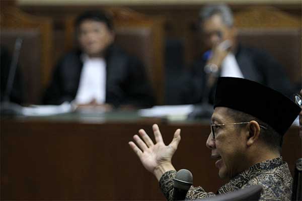 Menteri Agama Lukman Hakim Saifuddin menjawab pertanyaan Jaksa Penuntut Umum (JPU) KPK