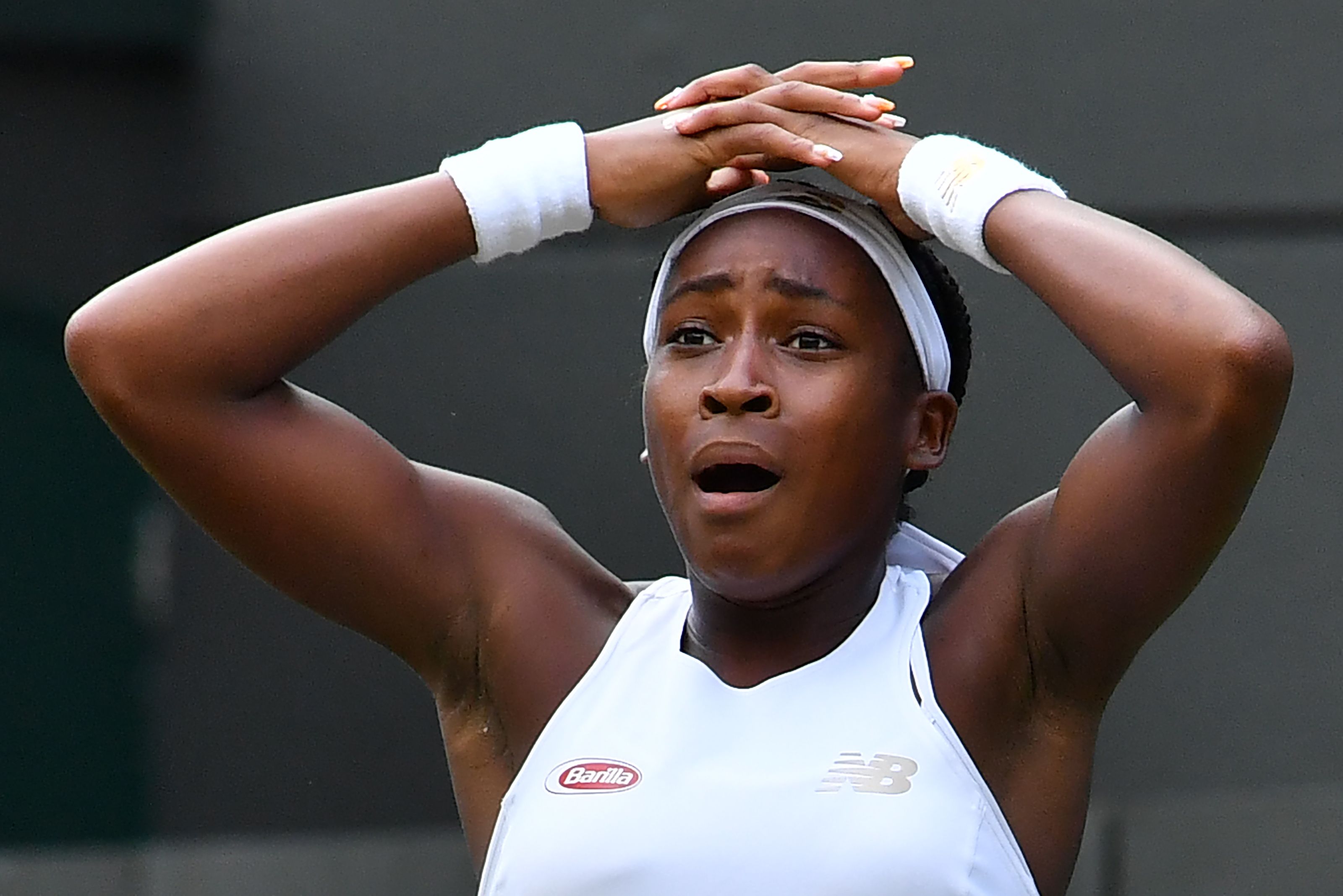 Petenis AS Cori Gauff bereaksi usai mengalahkan Venus Williams di putaran pertama Wimbledon.