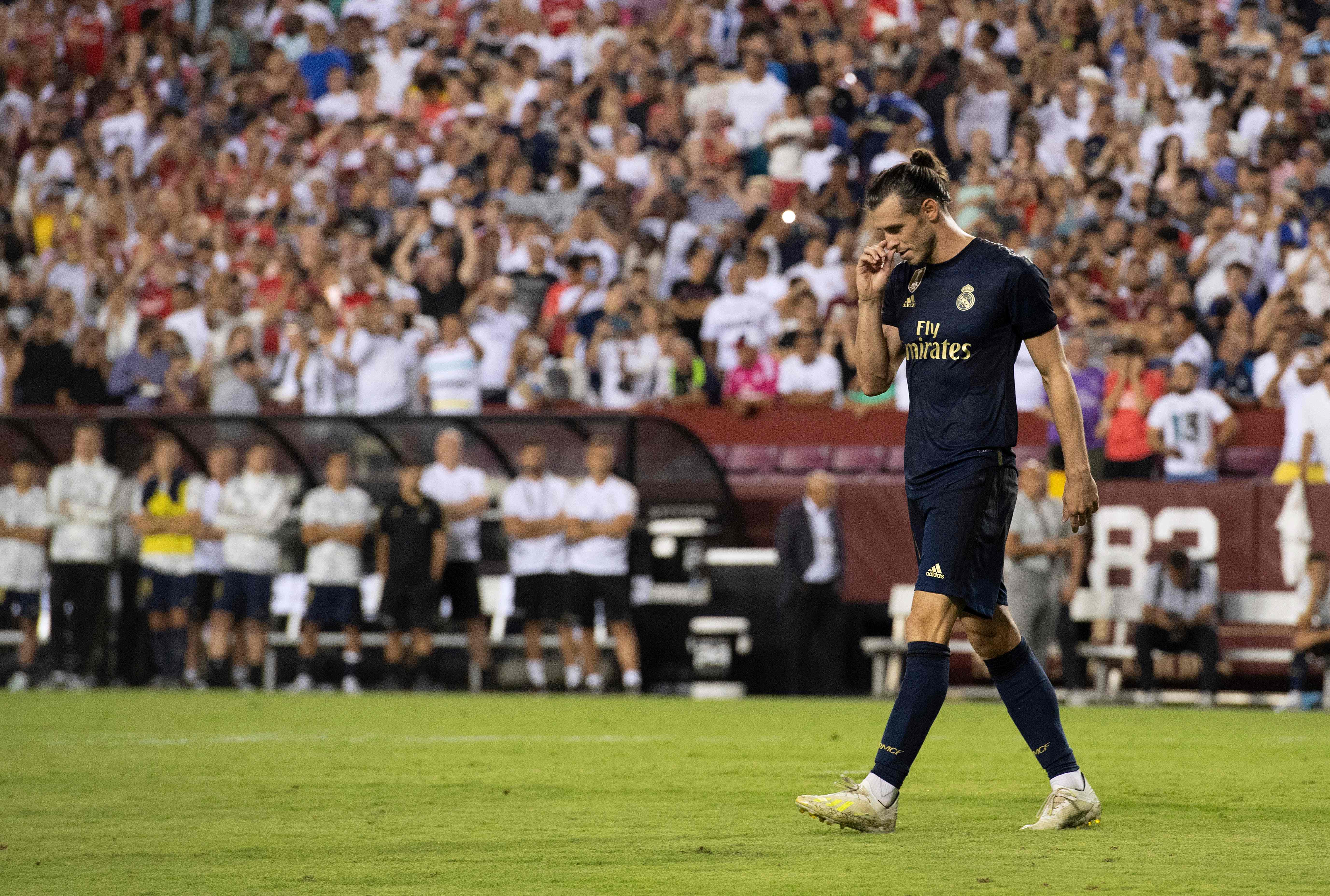  Gareth Bale tersenyum setelah sumbang gol untuk Real Madrid pada ajang the International Champions Cup 2019.