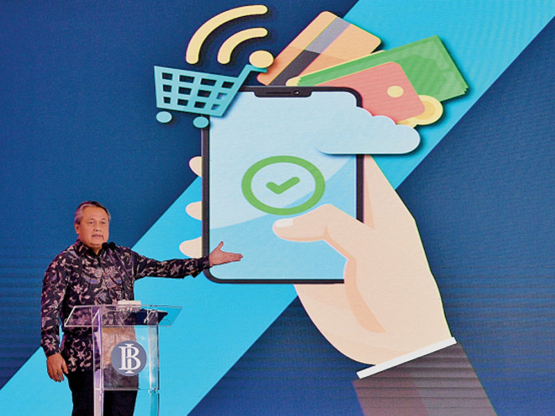 Gubernur Bank Indonesia (BI) Perry Warjiyo memberikan pengarahan dalam seminar internasional Transformasi Digital untuk Ekonomi Indonesia.