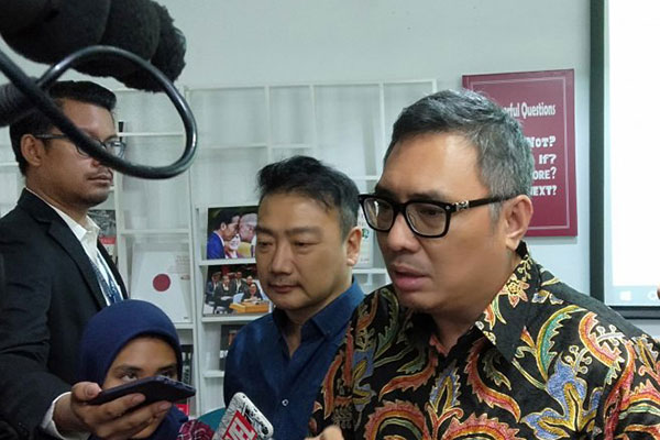 Presiden Indonesian Diaspora Network – Global (IDN-Global) Mark Gerald Eman (tengah)