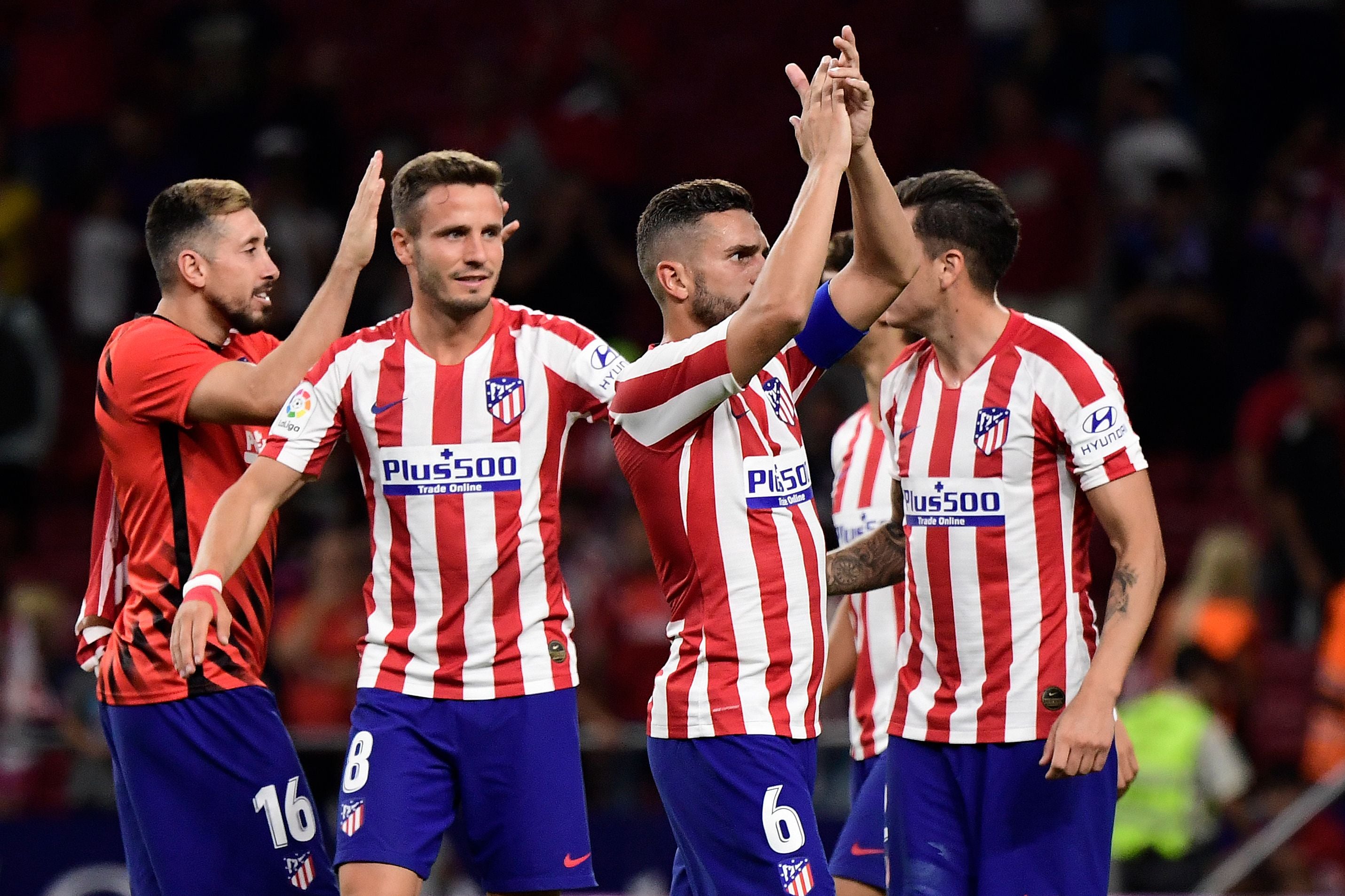 Para pemain Atletico Madrid merayakan kemenangan mereka atas Getafe dalam laga La Liga.