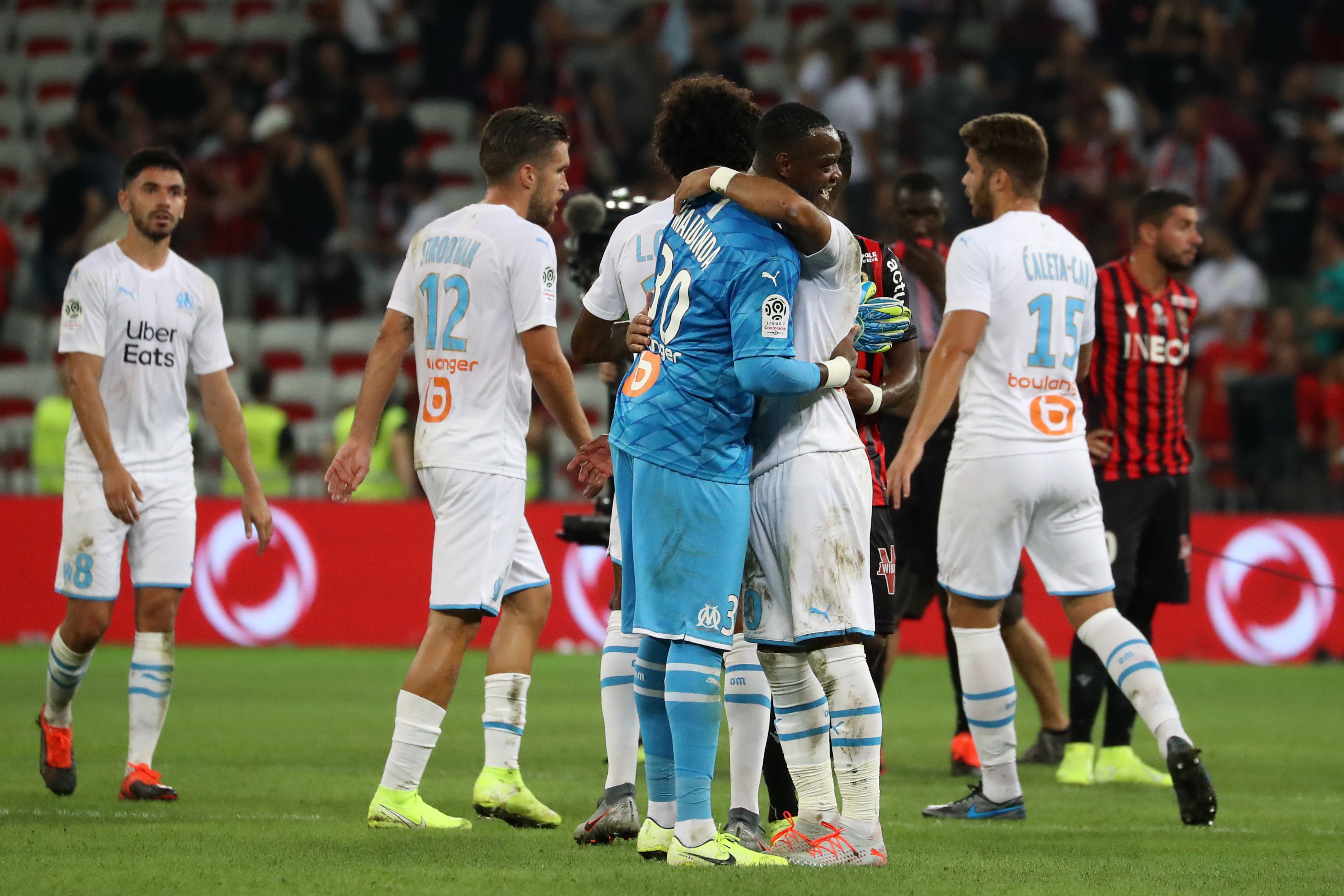 Para pemain Marseille merayakan kemenangan mereka atas Nice di laga Ligue 1.