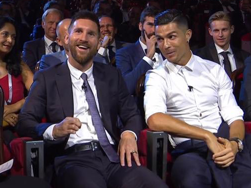 Lionel Messi (kiri) dan Cristiano Ronaldo