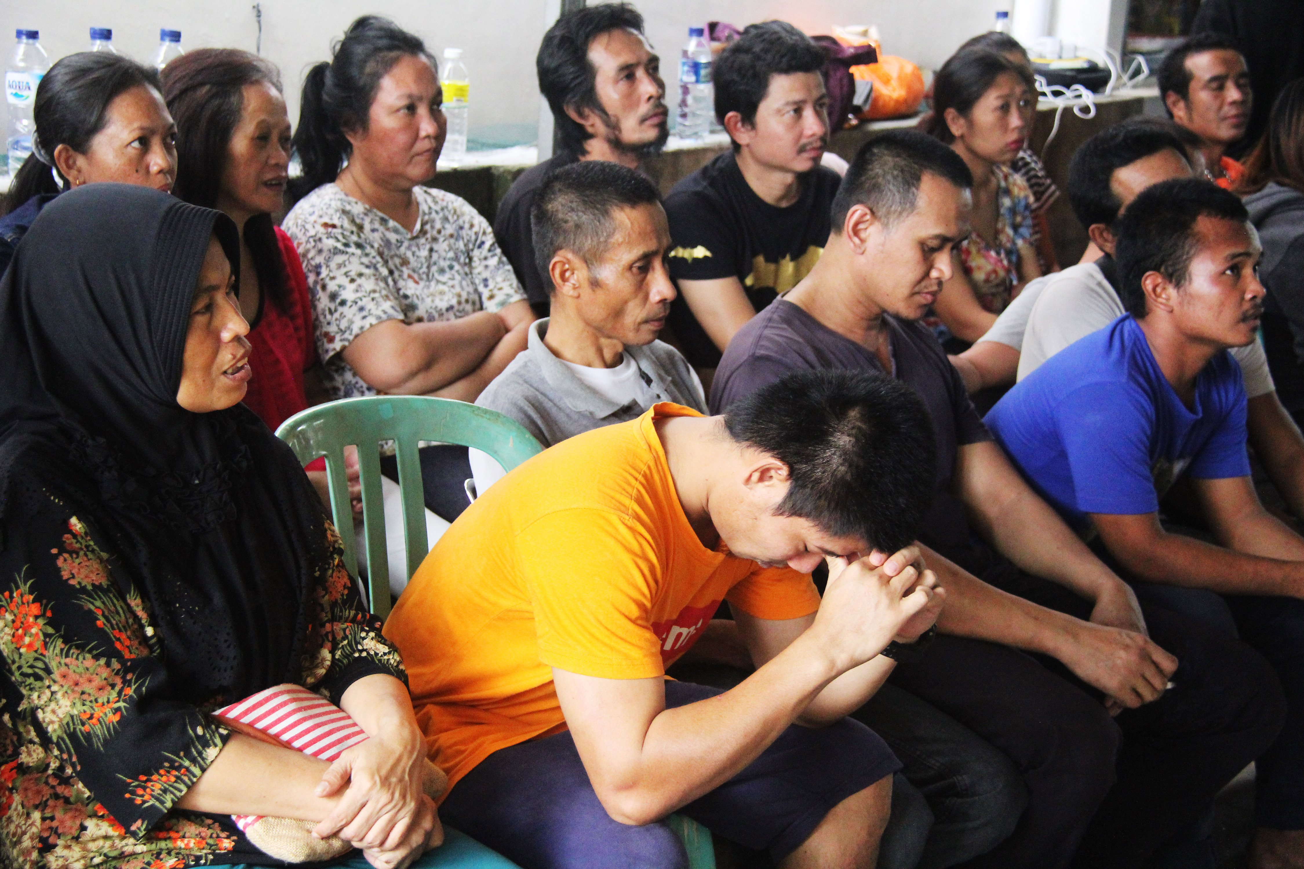 Pekerja migran ilegal yang dideportasi dari Malaysia.