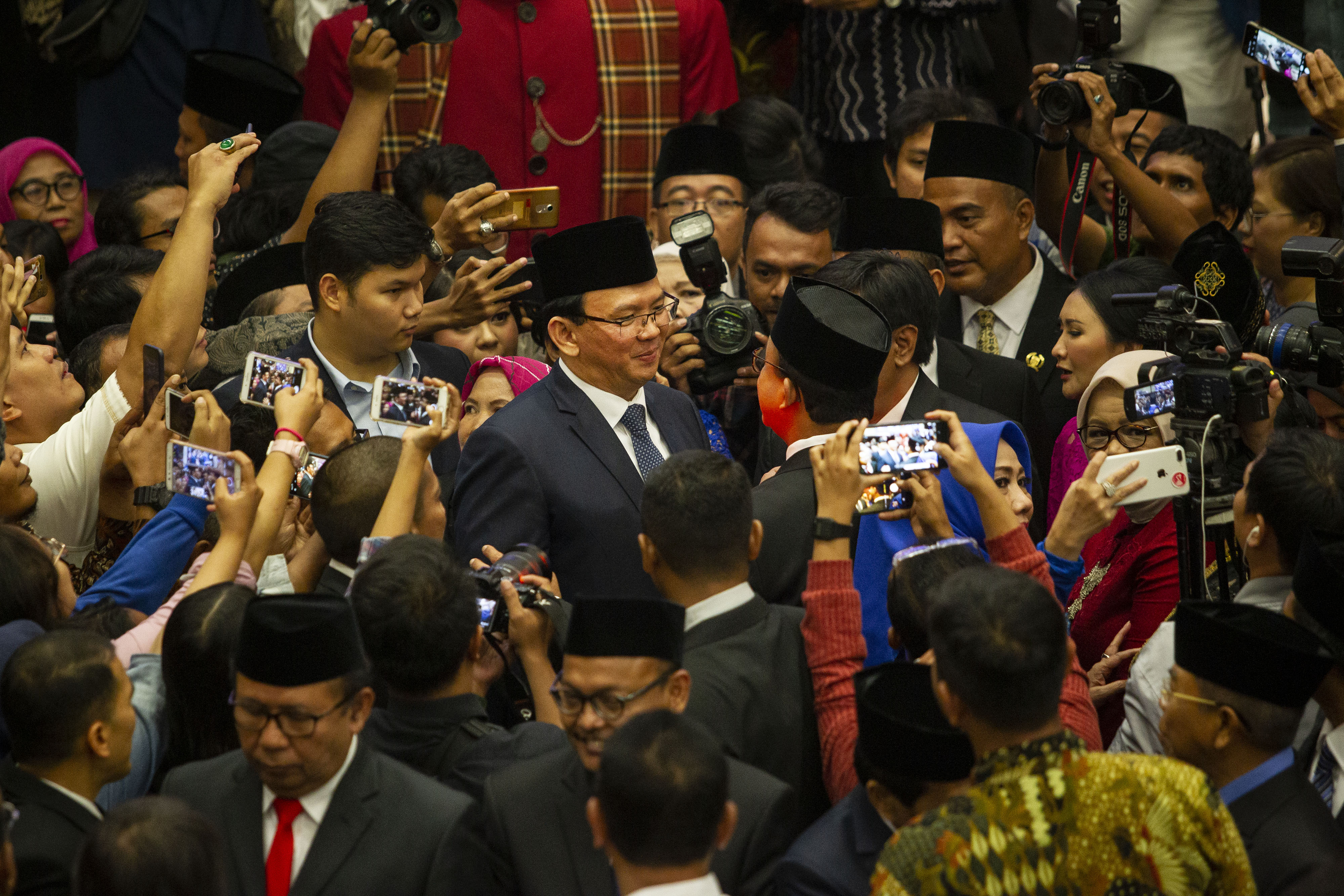 Mantan Gubernur DKI Jakarta Basuki Tjahaja Purnama menghadiri pelantikan anggota DPRD DKI Jakarta