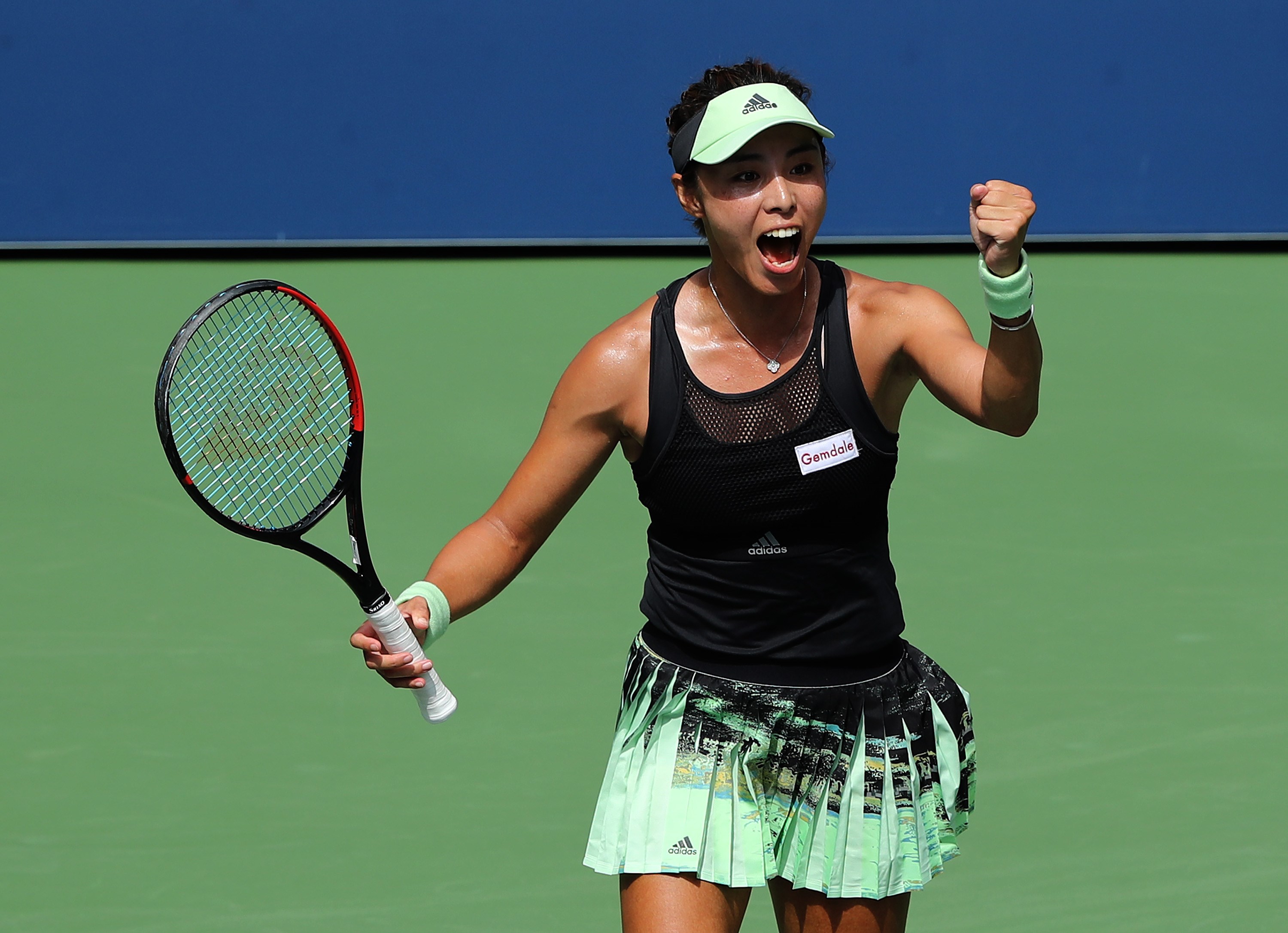 Petenis Tiongkok Qiang Wang.