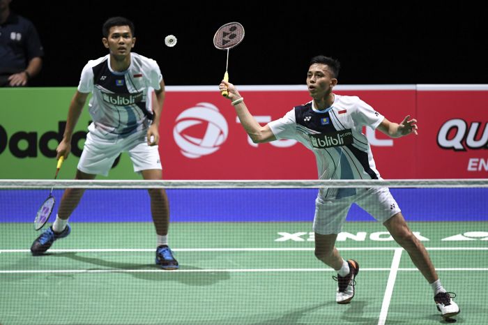 Ganda putra Indonesia Muhammad Rian Ardianto (kanan) dan Fajar Alfian melaju ke babak 16 besar Kejuaraan Dunia Bulu Tangkis 2019.