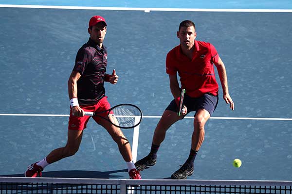Novak Djokovic berpasangan dengan Filip Krajinovic