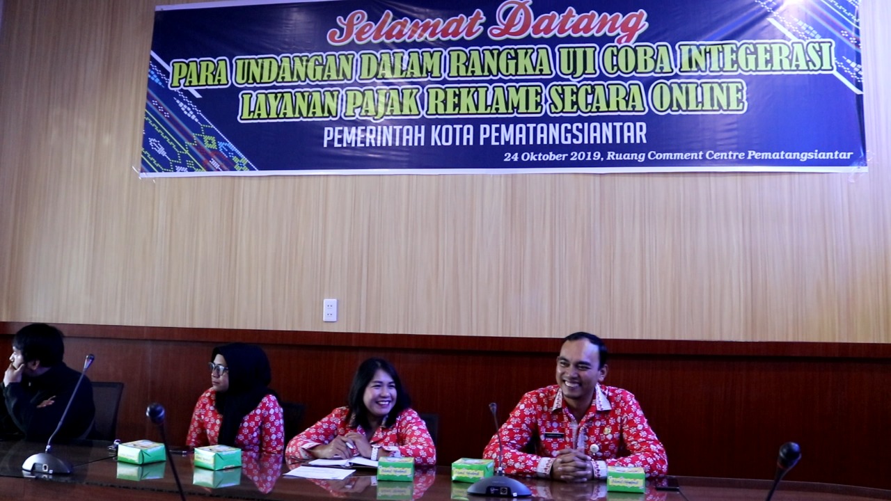 Pemkot Pematangsiantar  melakukan uji coba integrasi layanan pajak reklame secara online.
