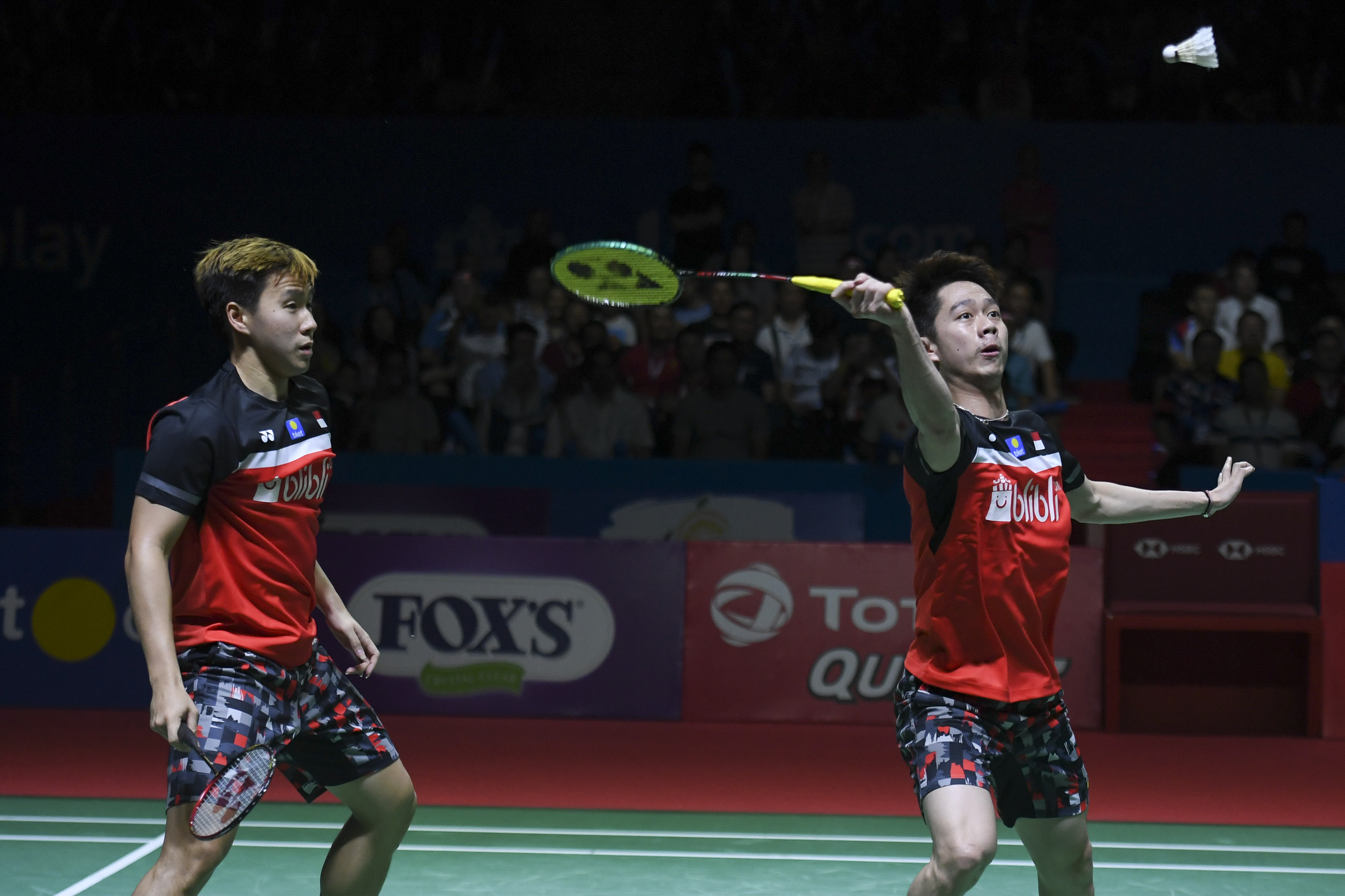Pebulu tangkis ganda putra Indonesia Kevin Sanjaya Sukamuljo (kanan) dan Marcus Fernaldi Gideon
