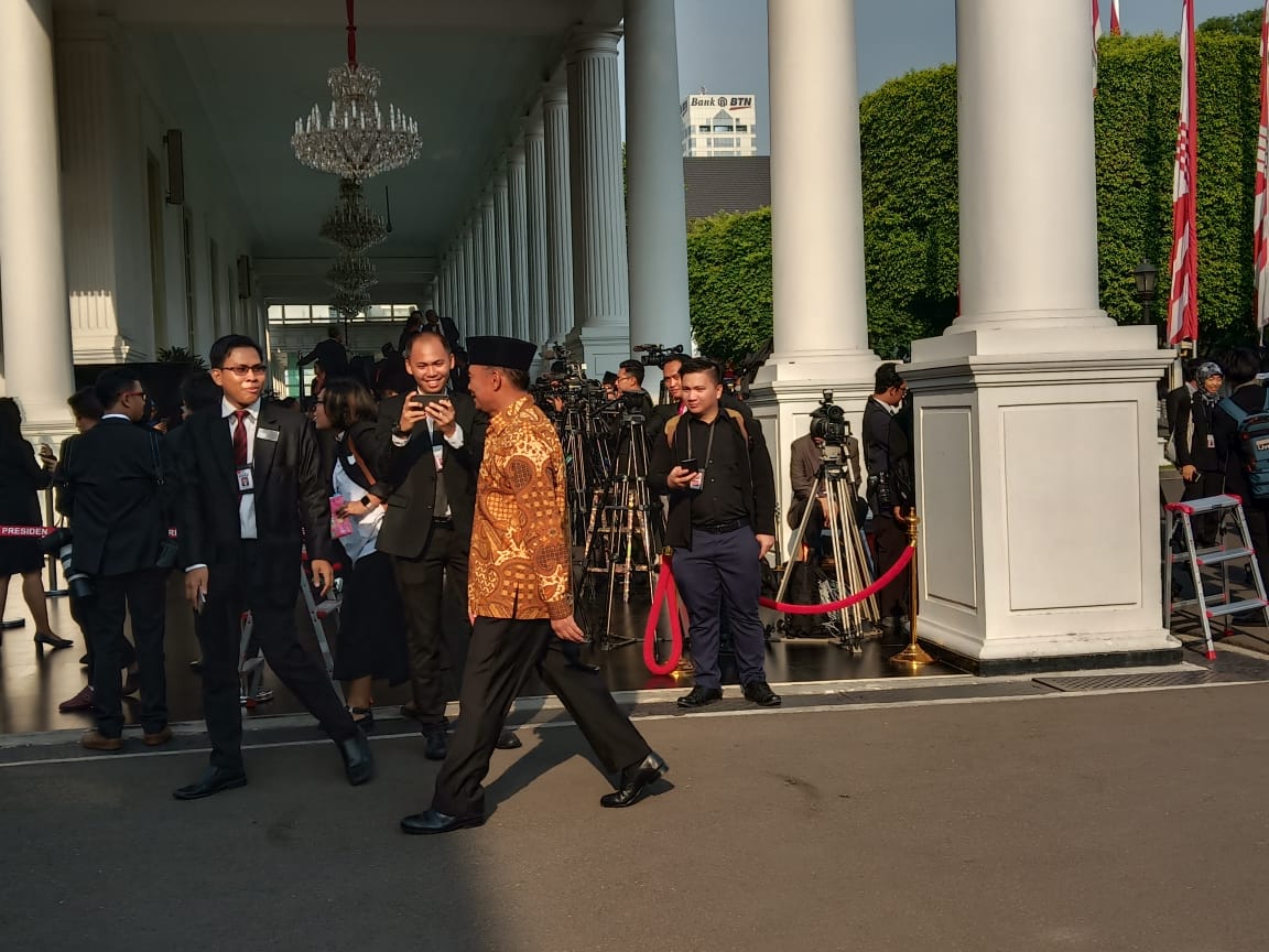 Menteri Pendidikan dan Kebudayaan 2014-2019 Muhadjir Effendy saat tiba di Istana Merdeka