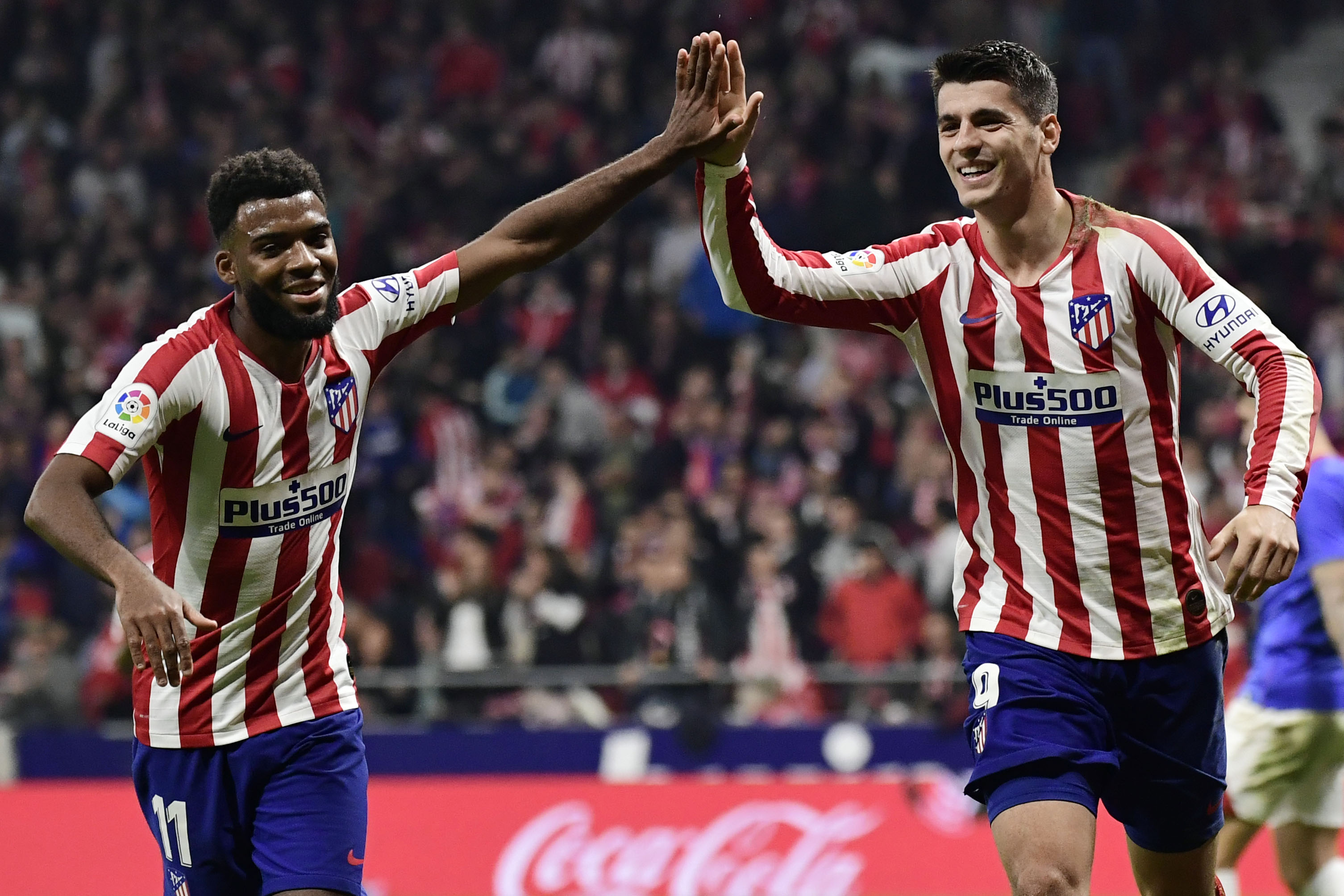 Luapan kegembiraan pemain Atletico Madrid,  Alvaro Morata usai membobol gawang  Athletic Club Bilbao dalam La Liga, Sabtu (26/10). 
