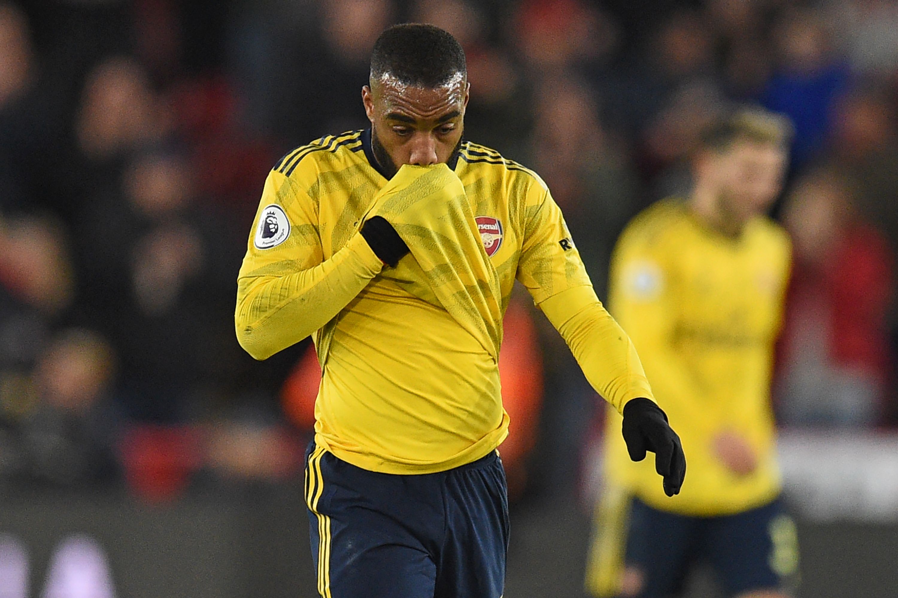 Penyerang Arsenal Alexandre Lacazette bereaksi usai laga melawan Sheffield United yang berakhir 0-1 untuk kekalahan the Gunners.