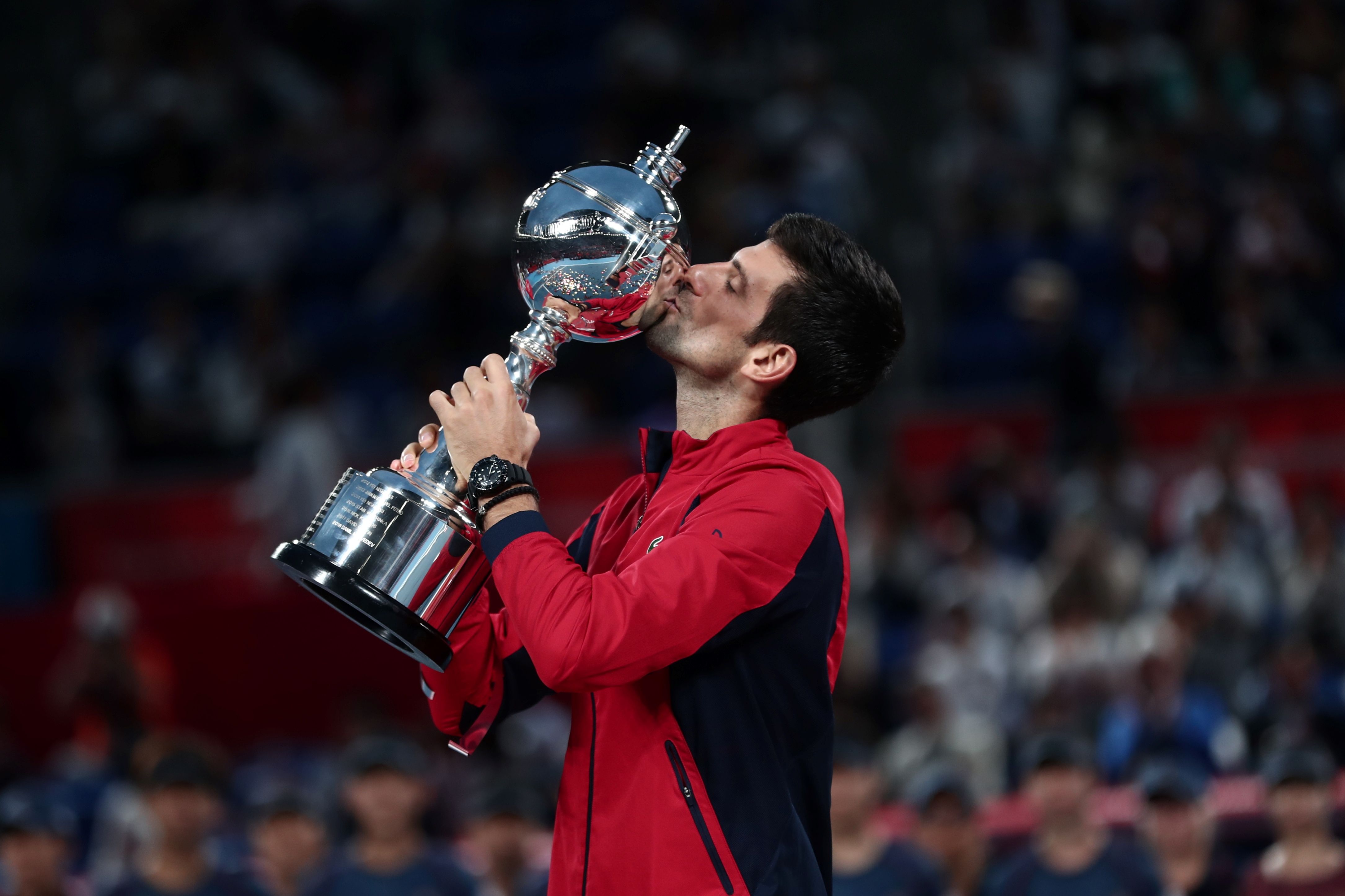 Novak Djokovic merayakan kemenangannya di Jepang Terbuka