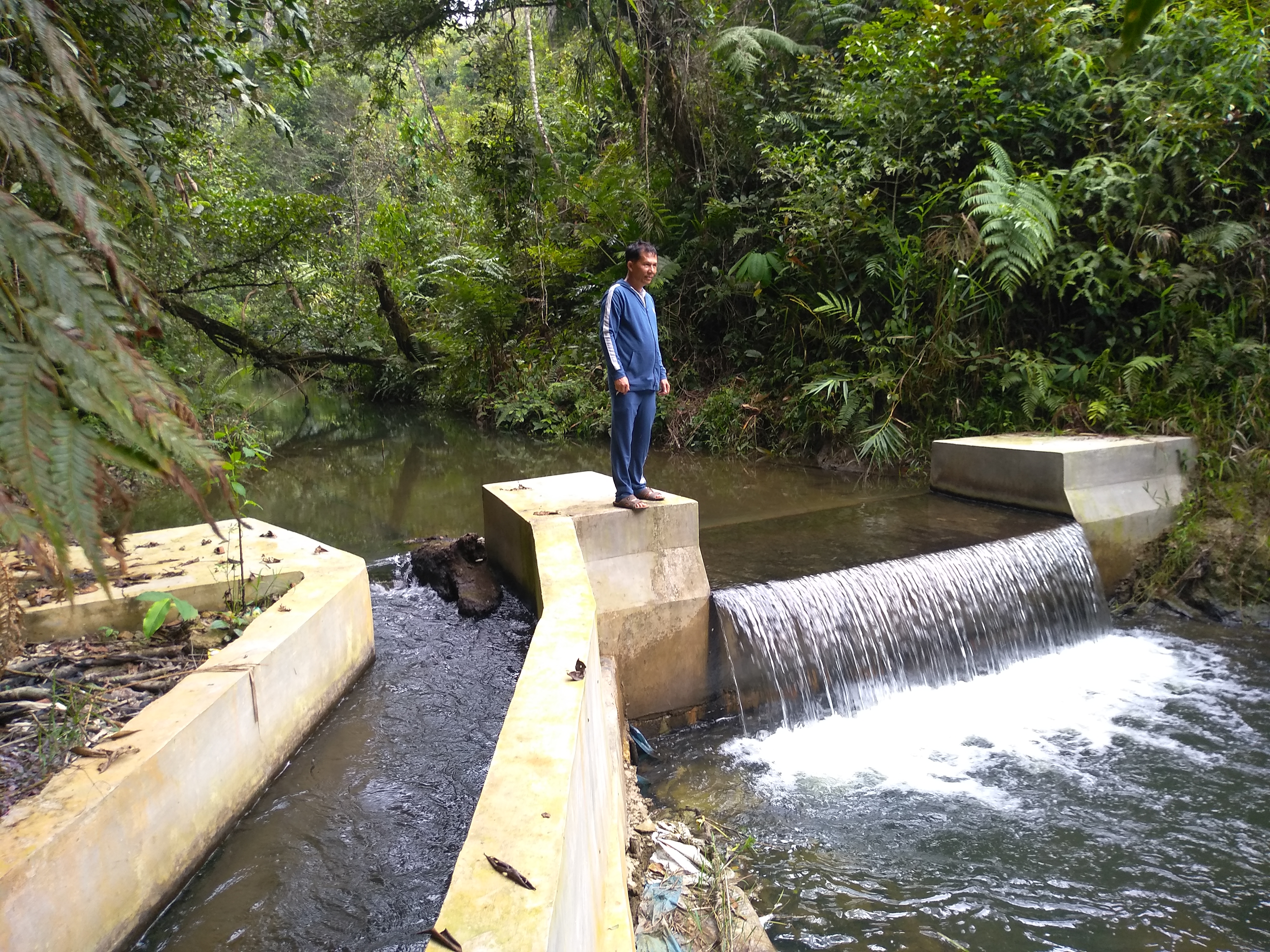 Pembangunan irigasi untuk pertanian di Desa Dolok Nauli Kecamatan Adian Koting, Kabupaten Tapanuli Utara,  dengan menggunakan dana desa