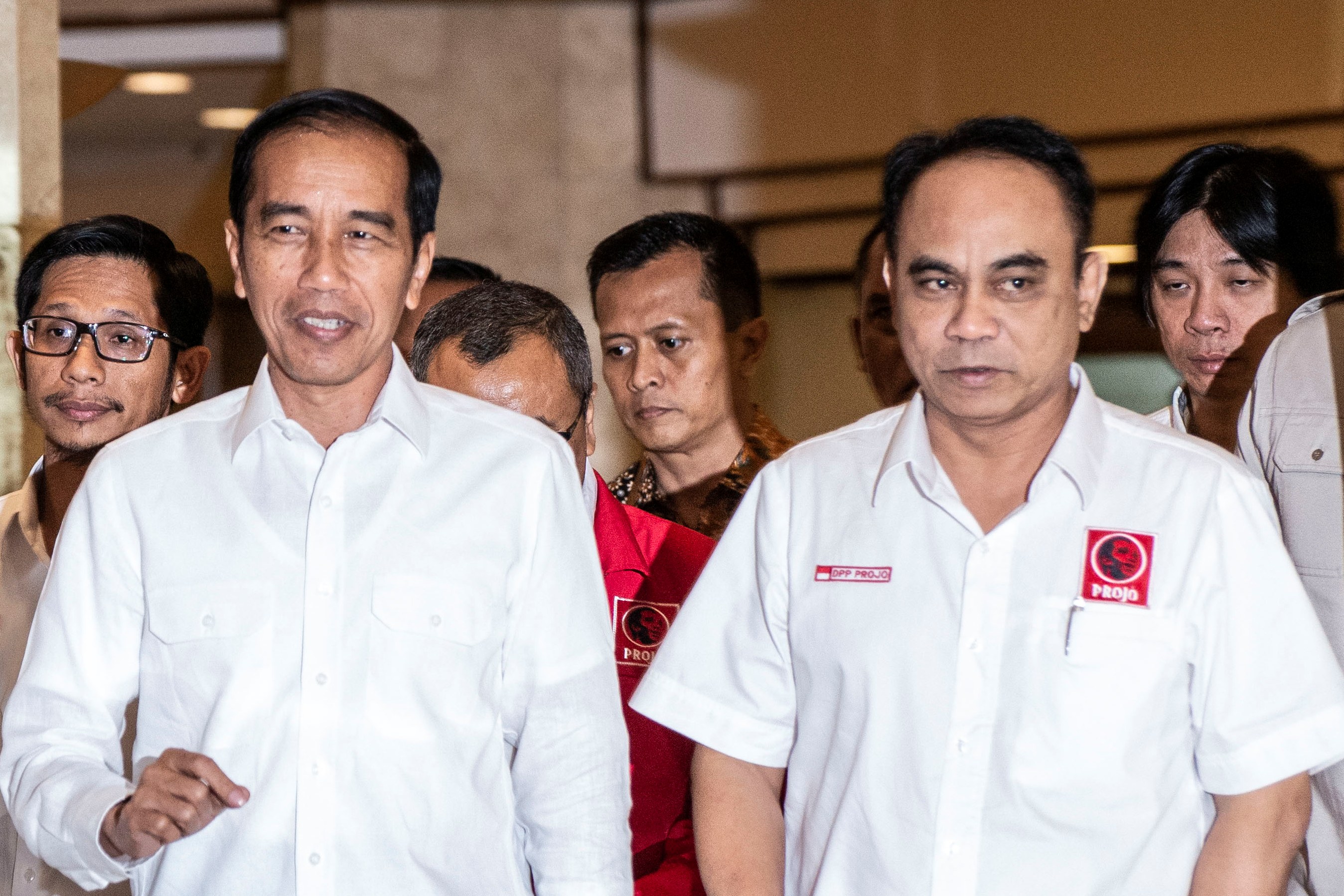 Presiden Joko Widodo (tengah) bersama Ketua Umum DPP Projo Budi Arie Setiadi (kanan) dan Sekjen DPP Projo Handoko (kiri)