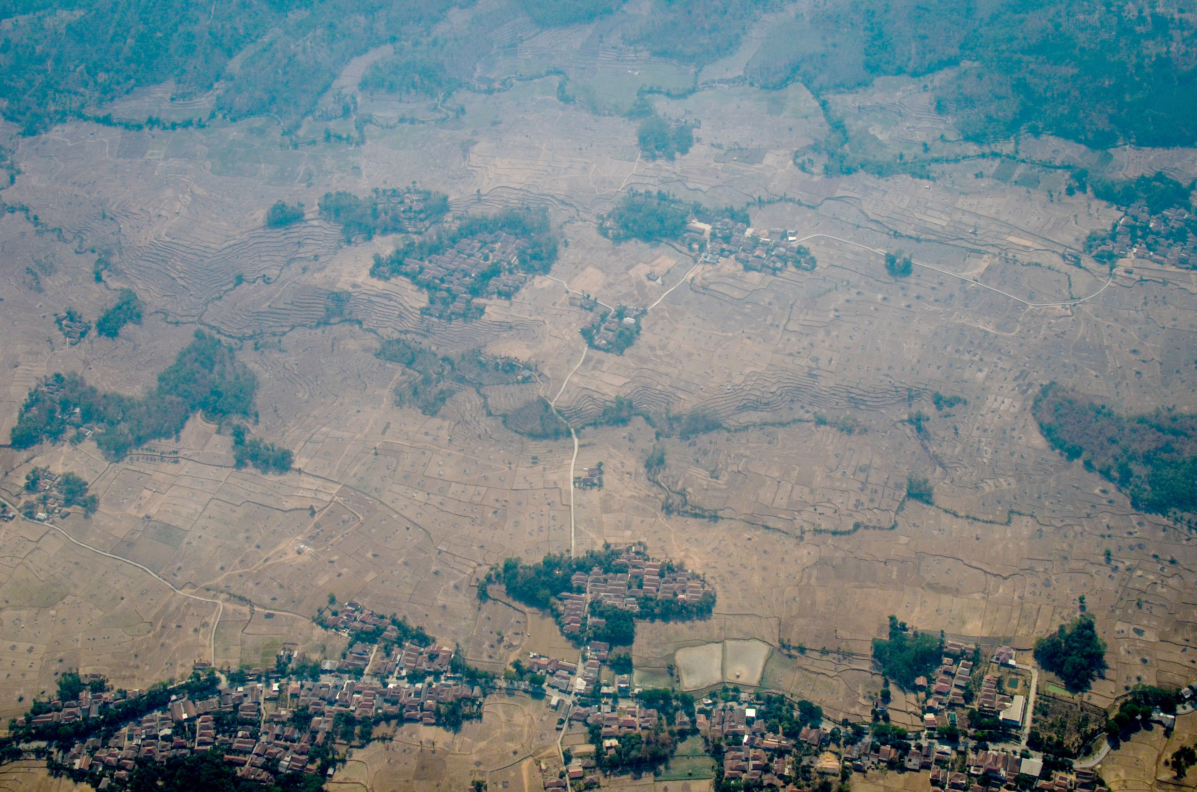 Foto udara lahan pertanian yang telah dipanen diambil dari pesawat CN 295 milik TNI di Kabupaten Purwakarta, Jawa Barat, Kamis (3/10/2019).