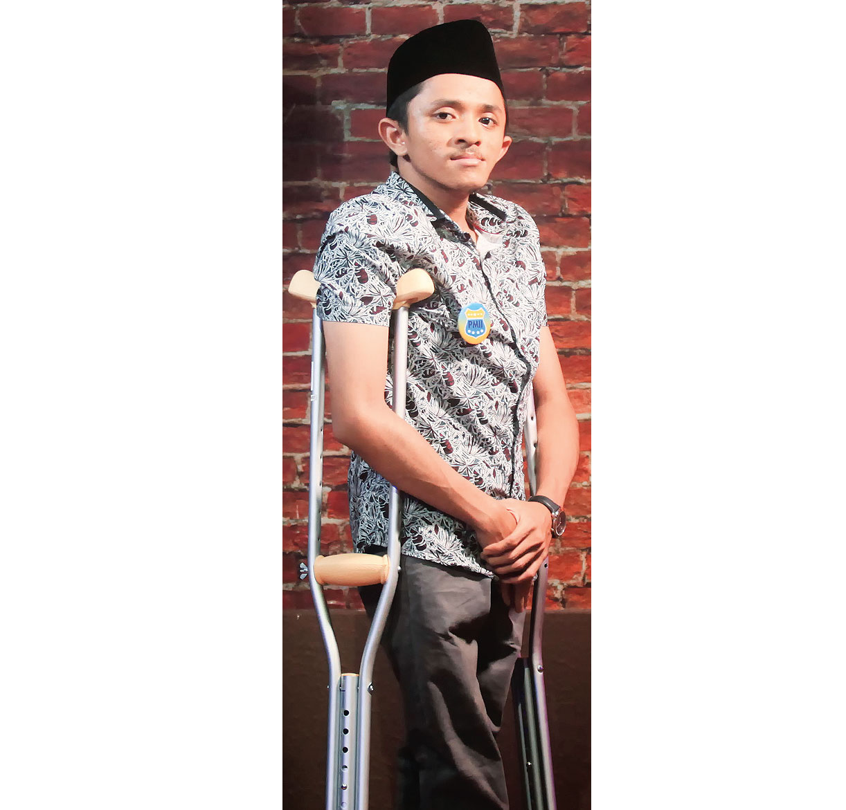 Anjas Pramono. Ia salah satu mahasiswa penyandang disabilitas