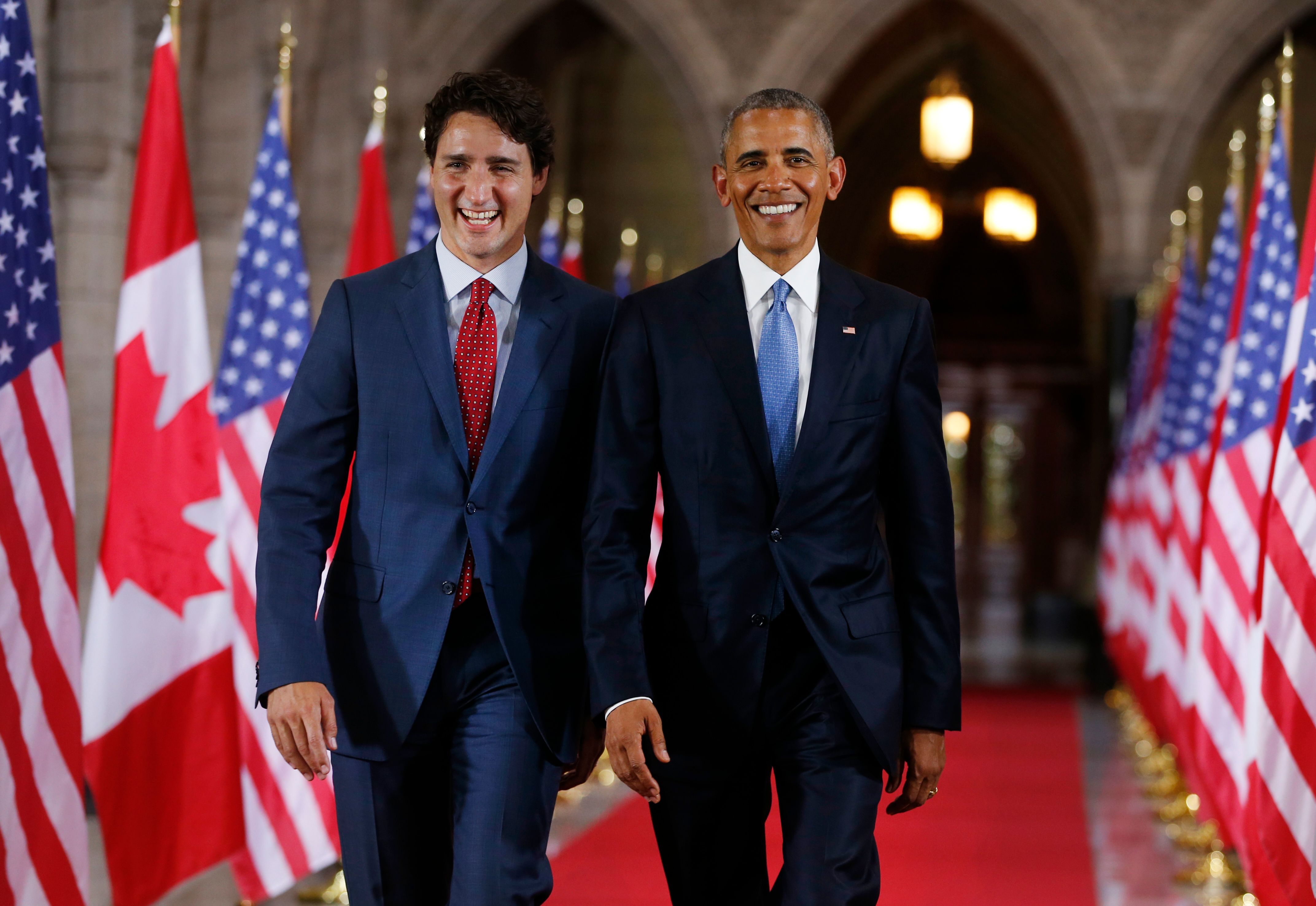 Perdana Menteri Kanada Justin Trudeau (kiri) bersama mantan Presiden AS Barack Obama