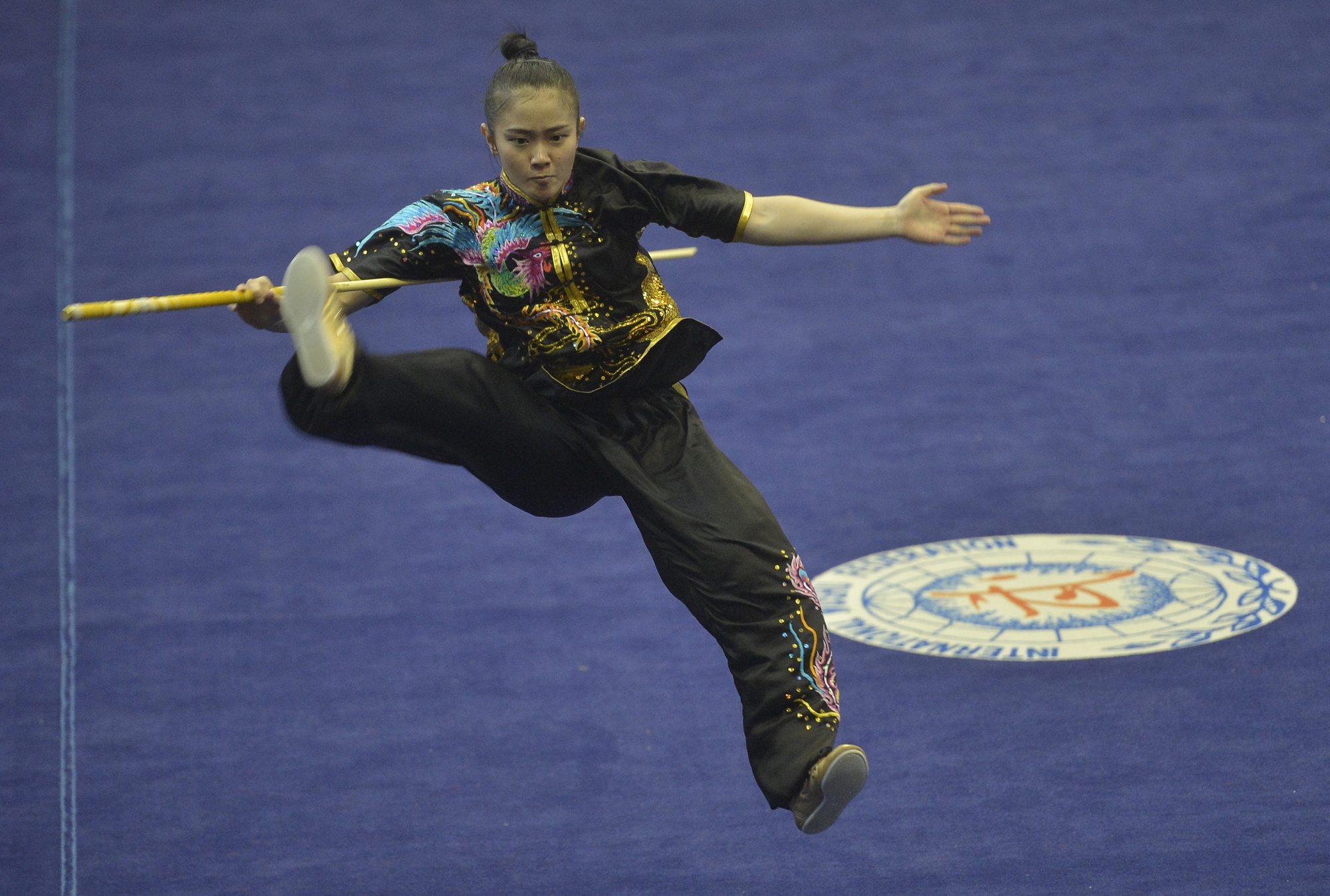 ilustrasi disiplin Taolu (seni) pada cabang olahraga wushu