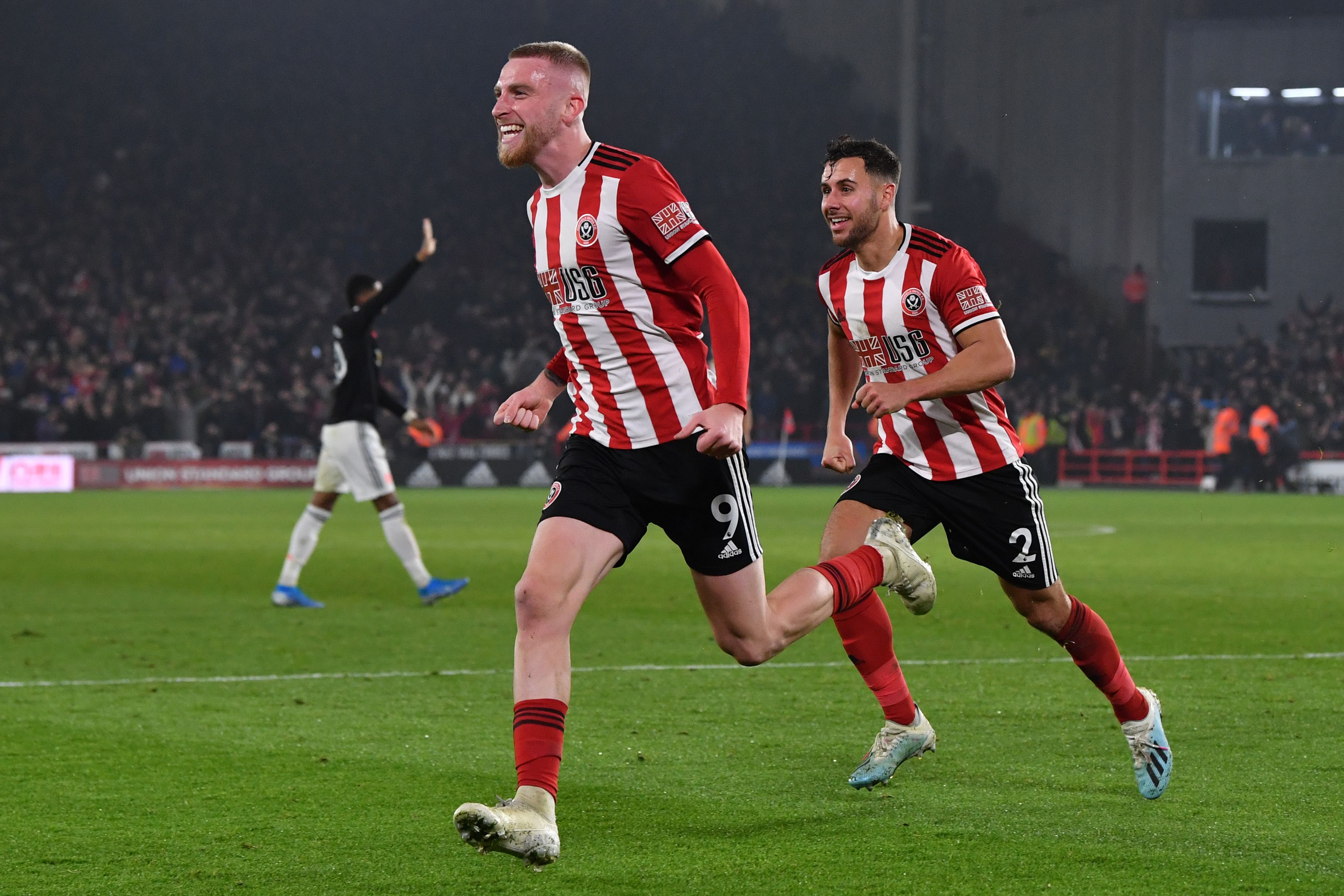 Pemain Sheffield United Oliver McBurnie merayakan golnya yang membuyarkan kemenangan Manchester United.