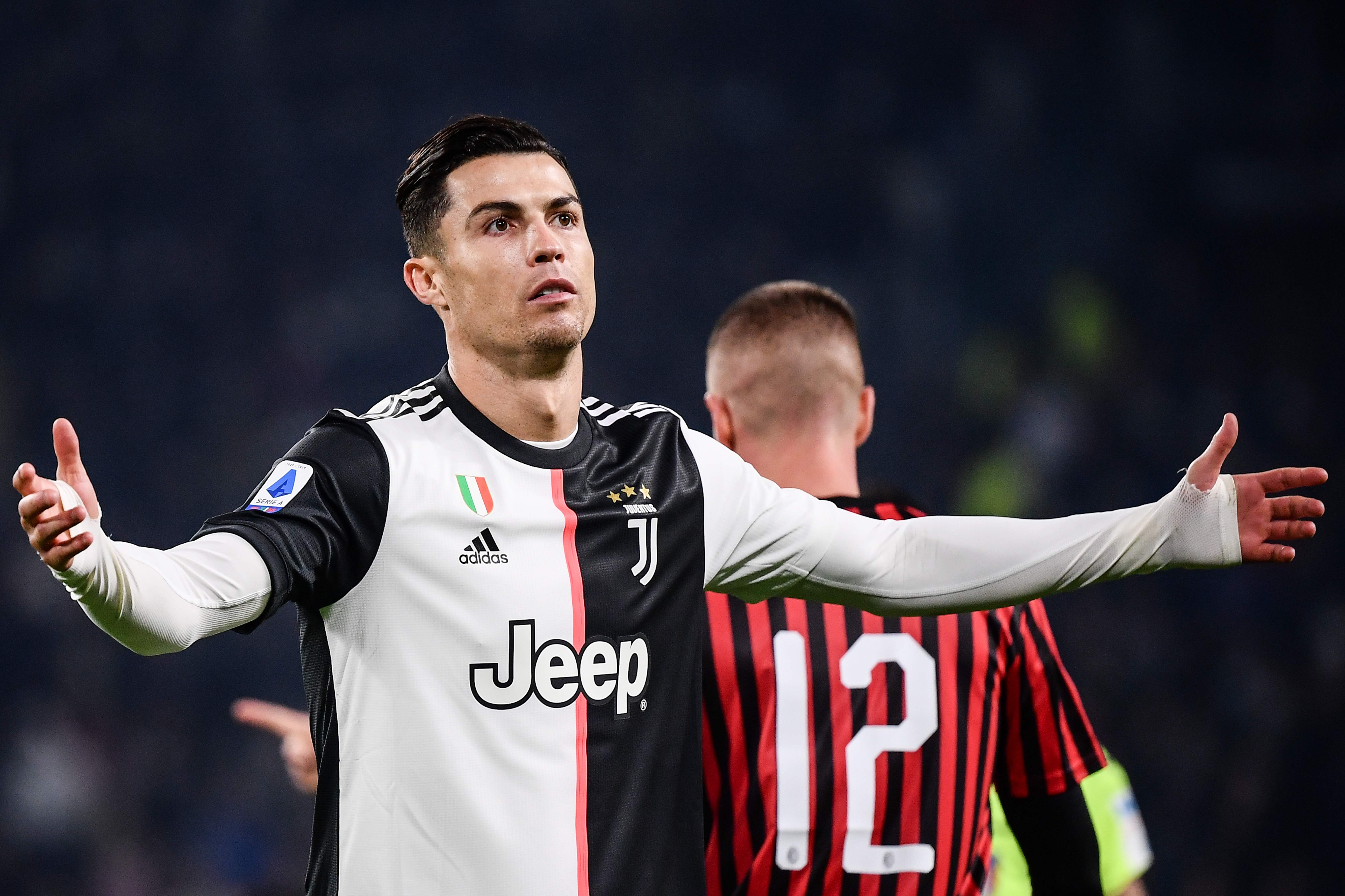 Cristiano Ronaldo bereaksi dalam laga Serie A antara Juventus dan AC Milan