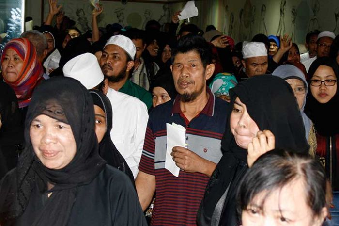 Para tenaga kerja Indonesia di negara Timur Tengah. 