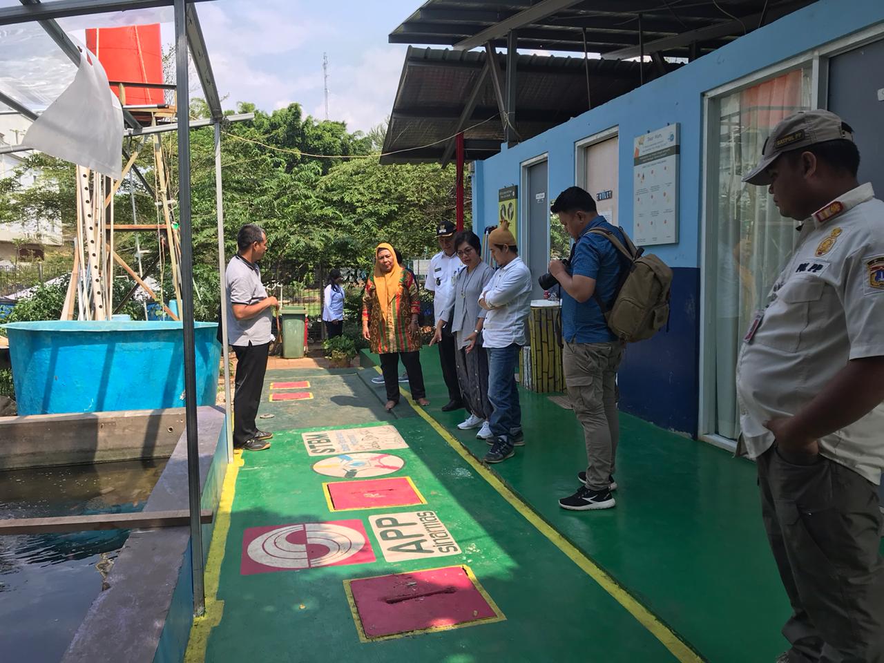 Peserta Lokakarya Simaskota melakukan tinjaun lapangan