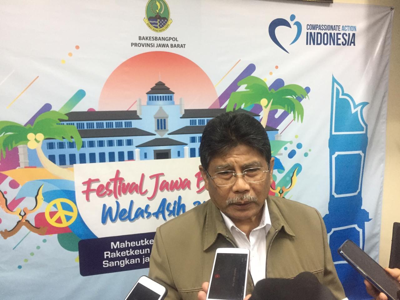 Kepala Badan Bakesbangpol Jabar, Herri Hudaya, saat menjelaskan kegiatan Festival Welas Asih di Bandung, Jabar, Rabu (18/12).