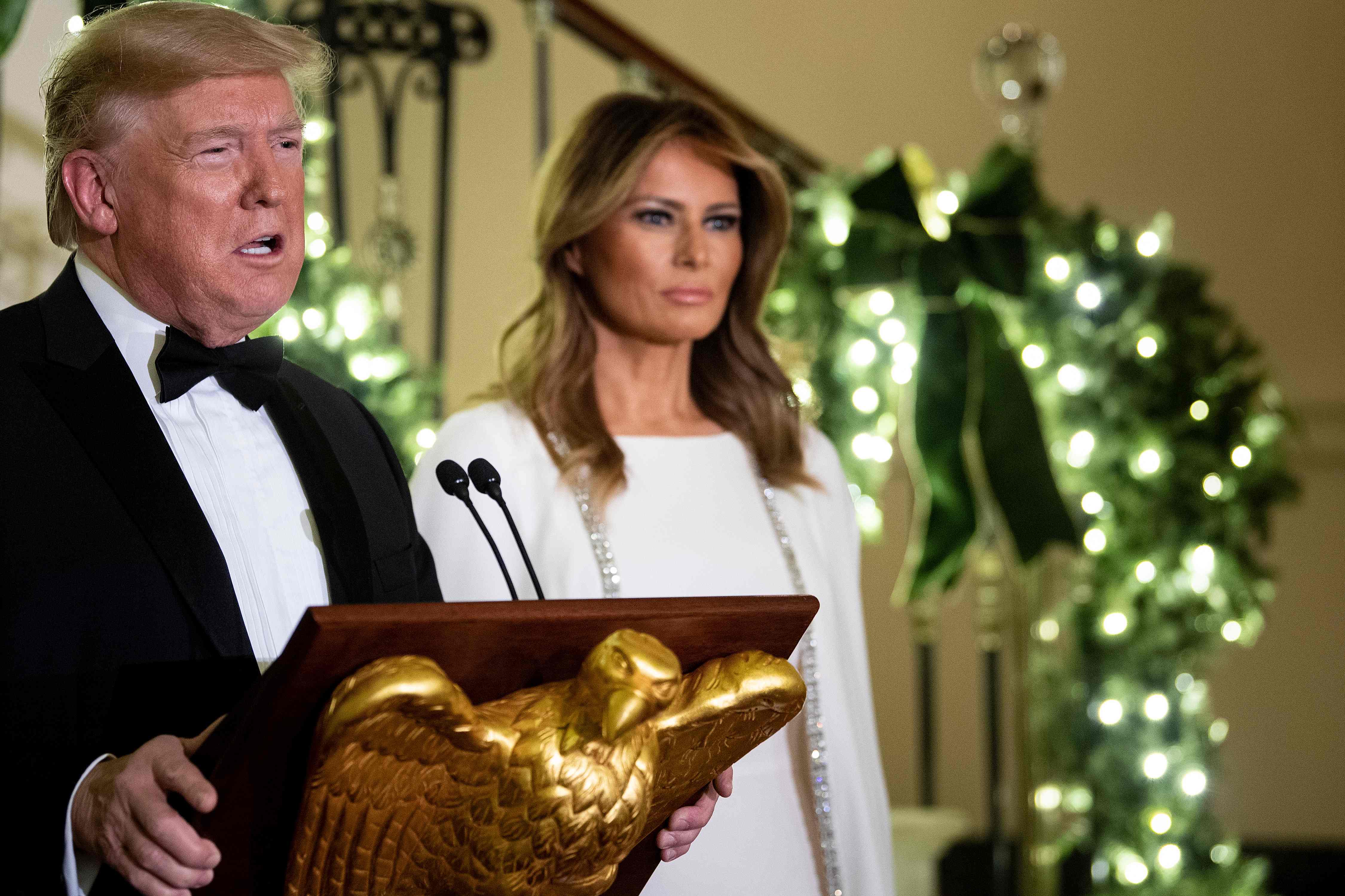 Presiden AS Donald Trump (kiri) bersama ibu negara Melania Trump