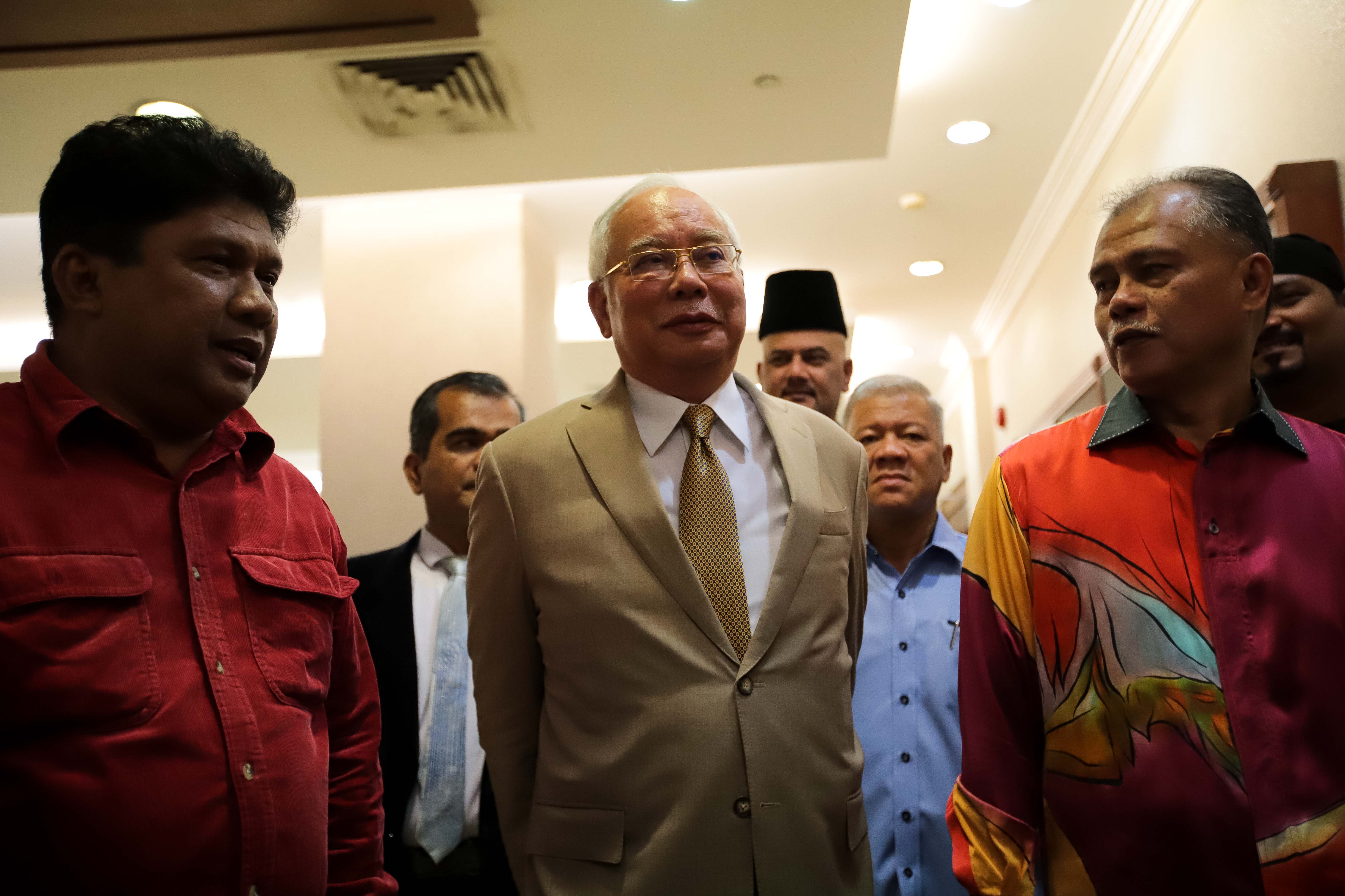 Mantan Perdana Menteri Malaysia Najib Razak tiba di pengadilan
